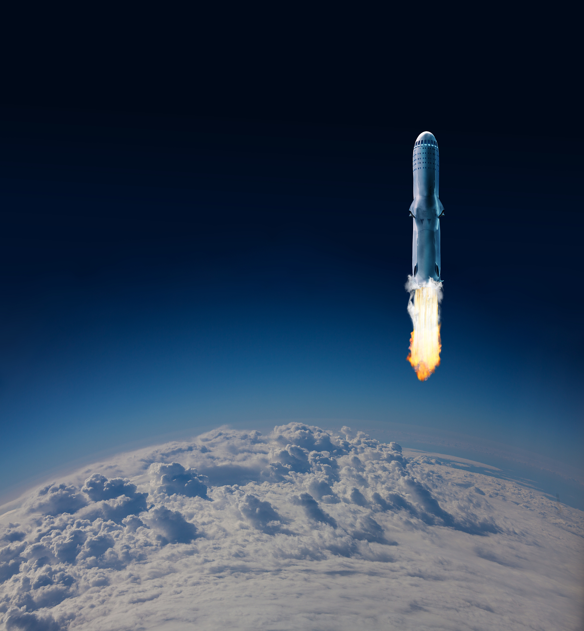 ignition of rocket first stage over earth clouds
