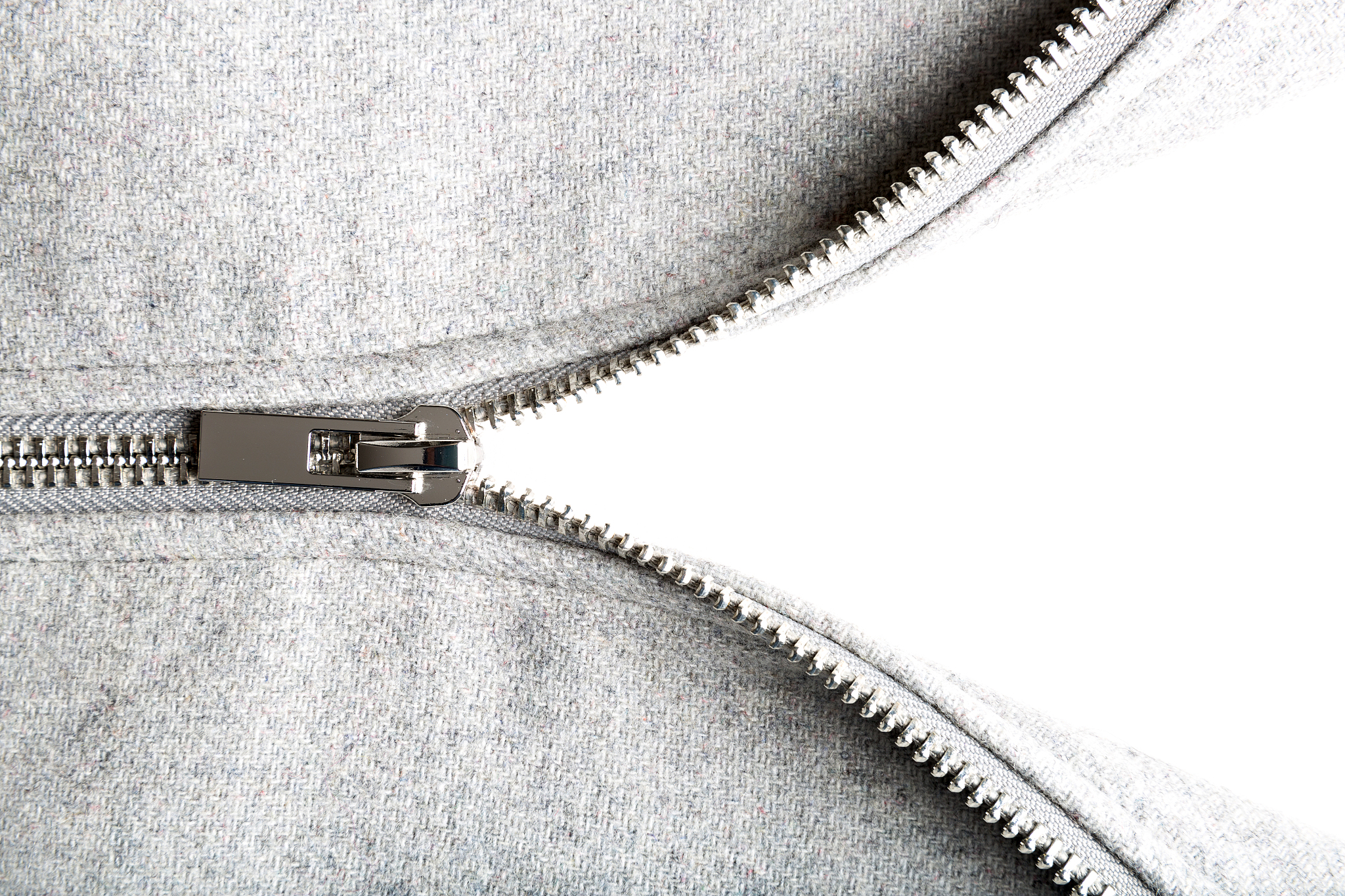 silver zip on woolen fabric