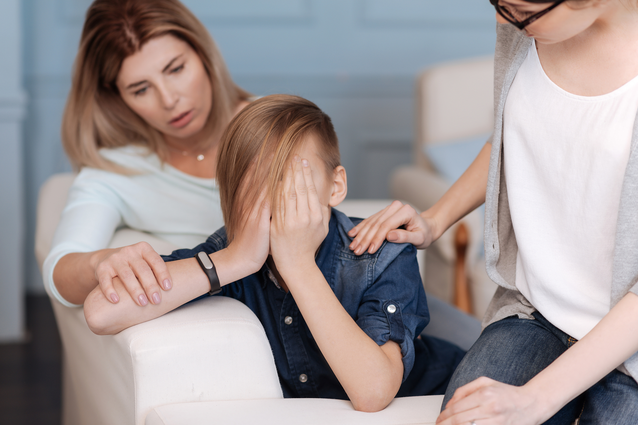 upset teenager keeping his face closed