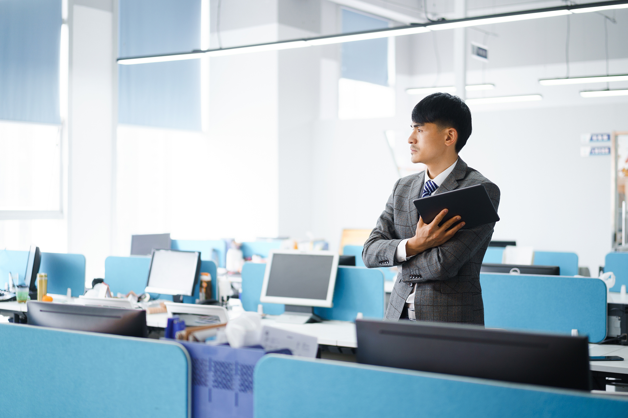 man stands in office