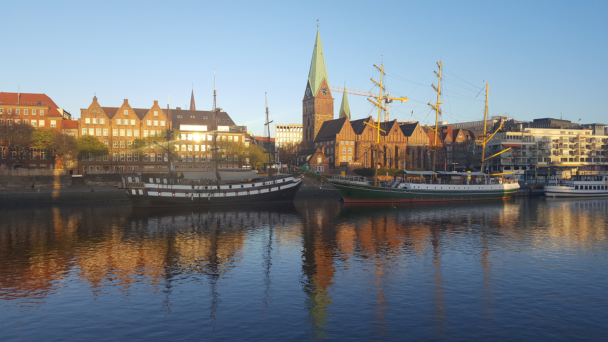 view of buildings in city against clear sky