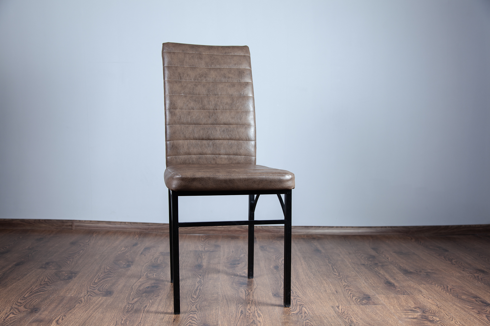 brown leather chair in studio