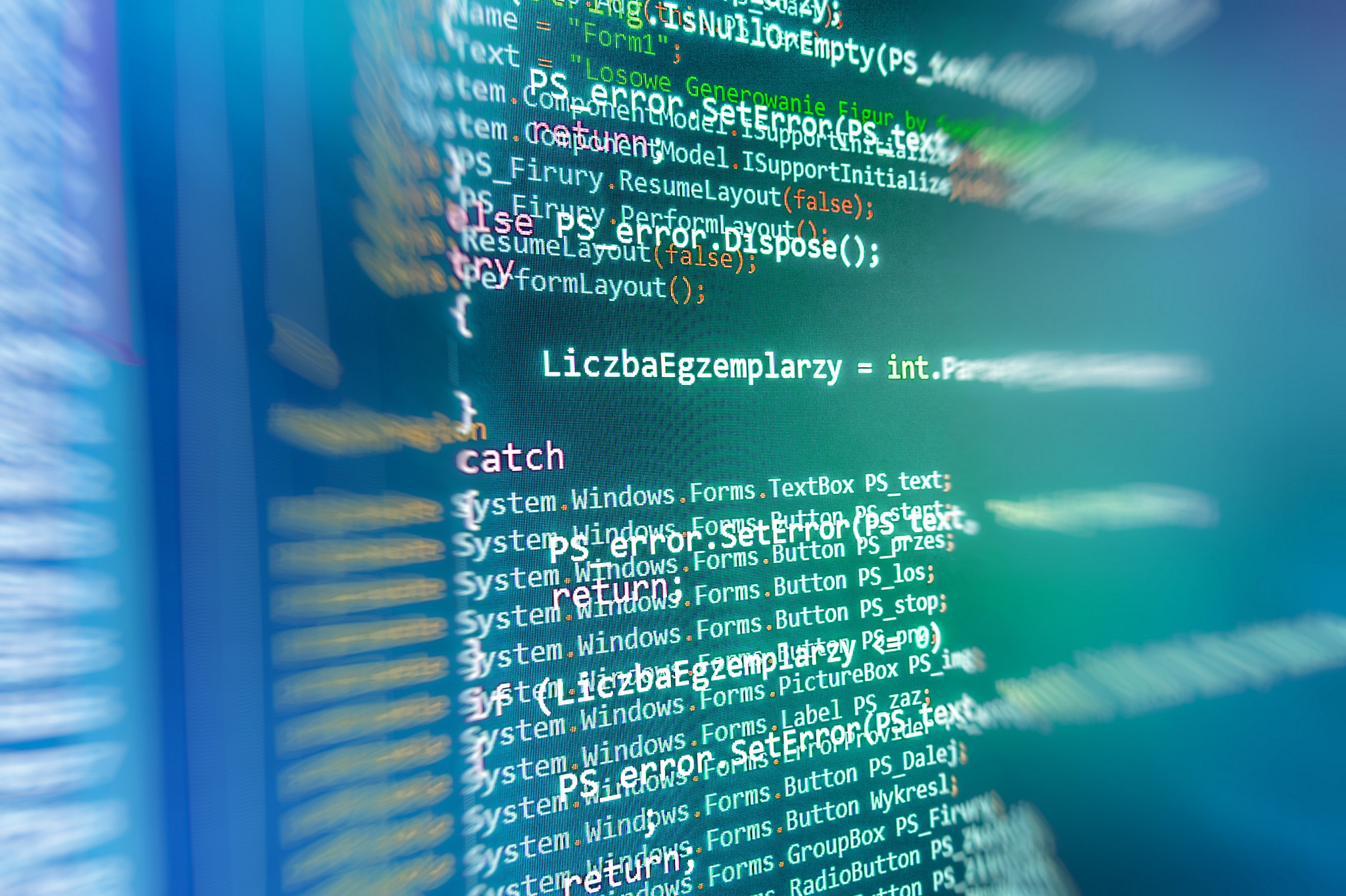 software developer programming code on computer