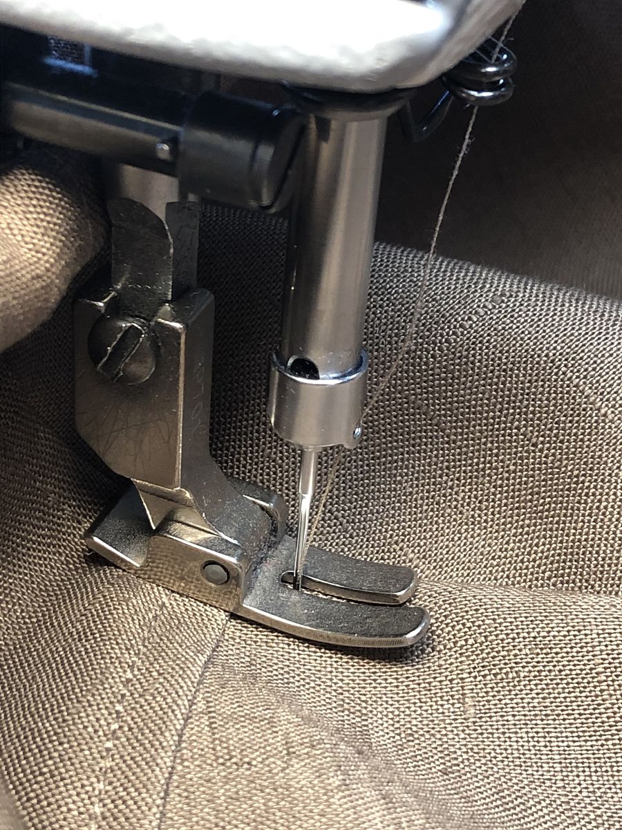 老式缝纫机压脚不走是咋回事