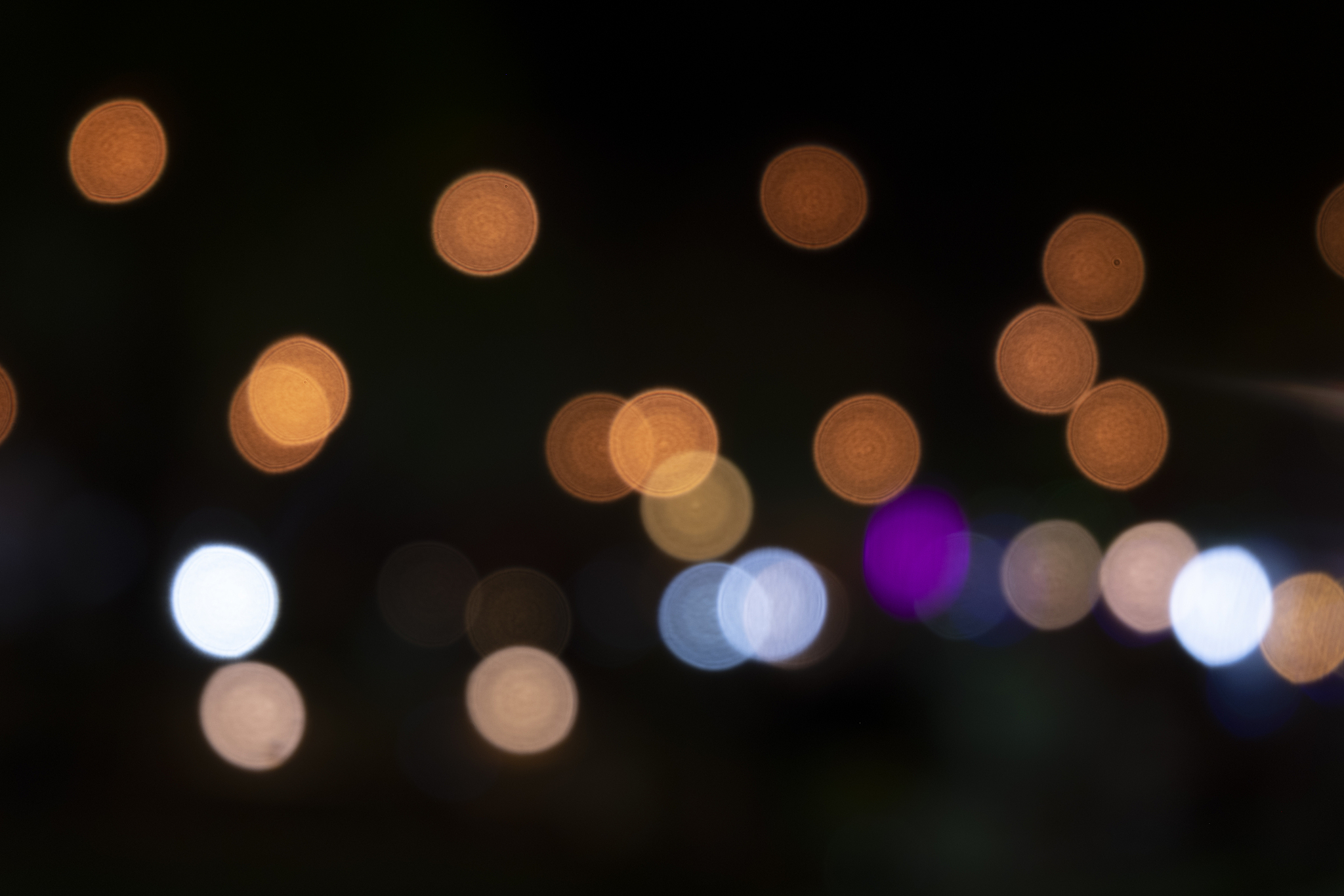 the light that blurts out is a beautiful bokeh on a black backgr