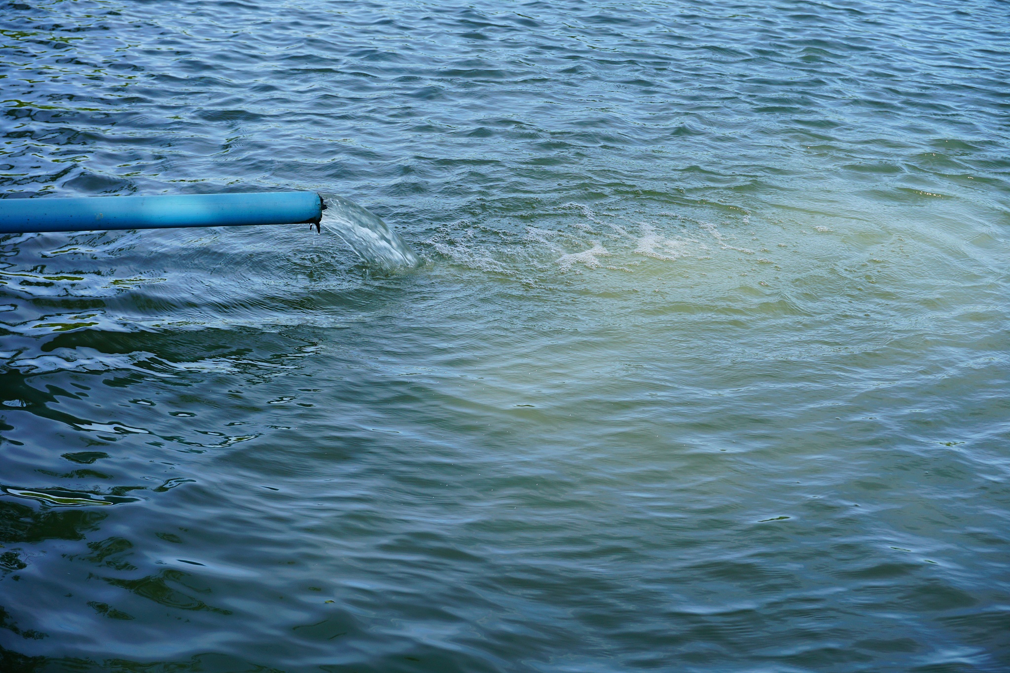 water pouring out from pipe