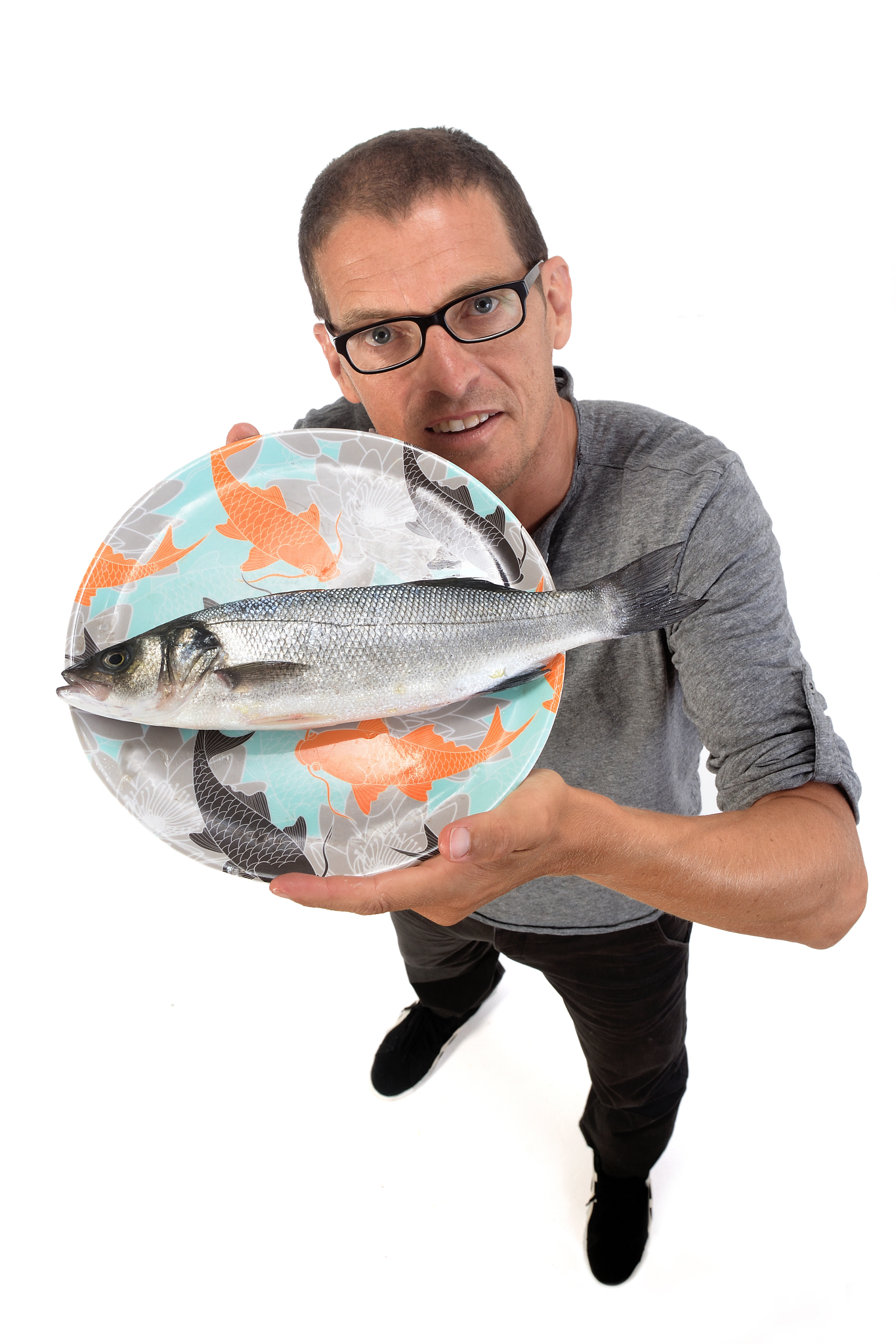 portrait of a man with food on white background