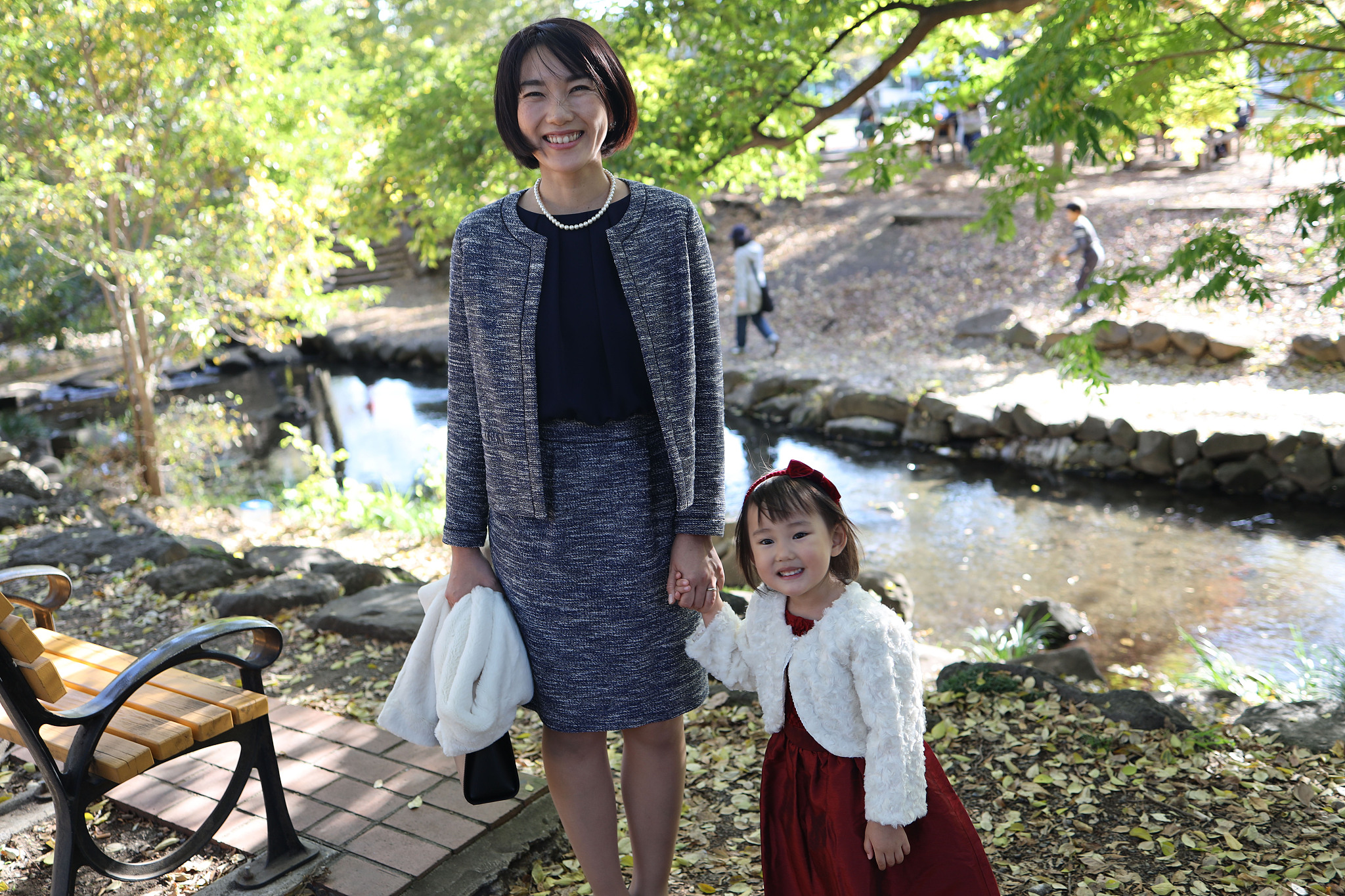 japanese mother walking  with her daughter at shichi go san cele