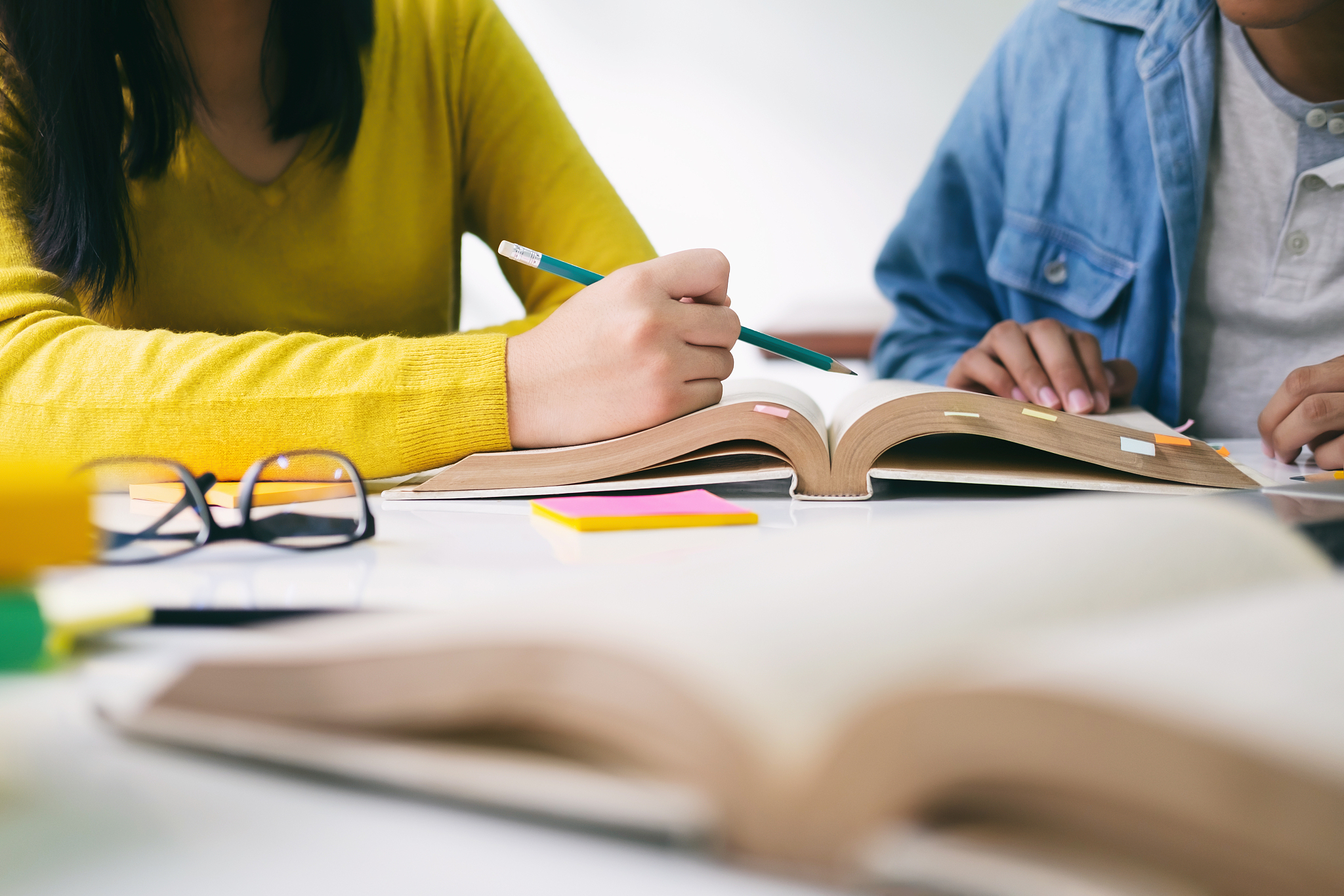young students campus helps friend catching up and learning.