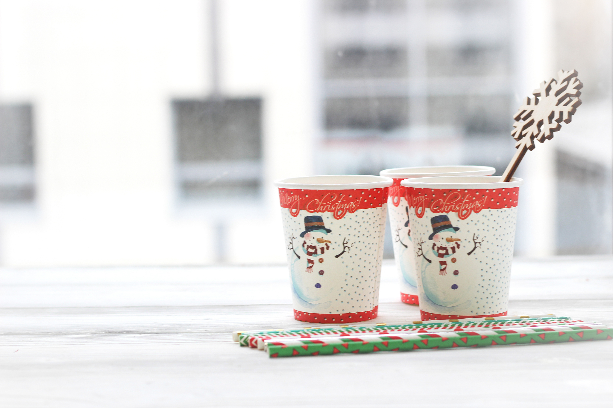festive still life: three glasses with a picture of a snowman