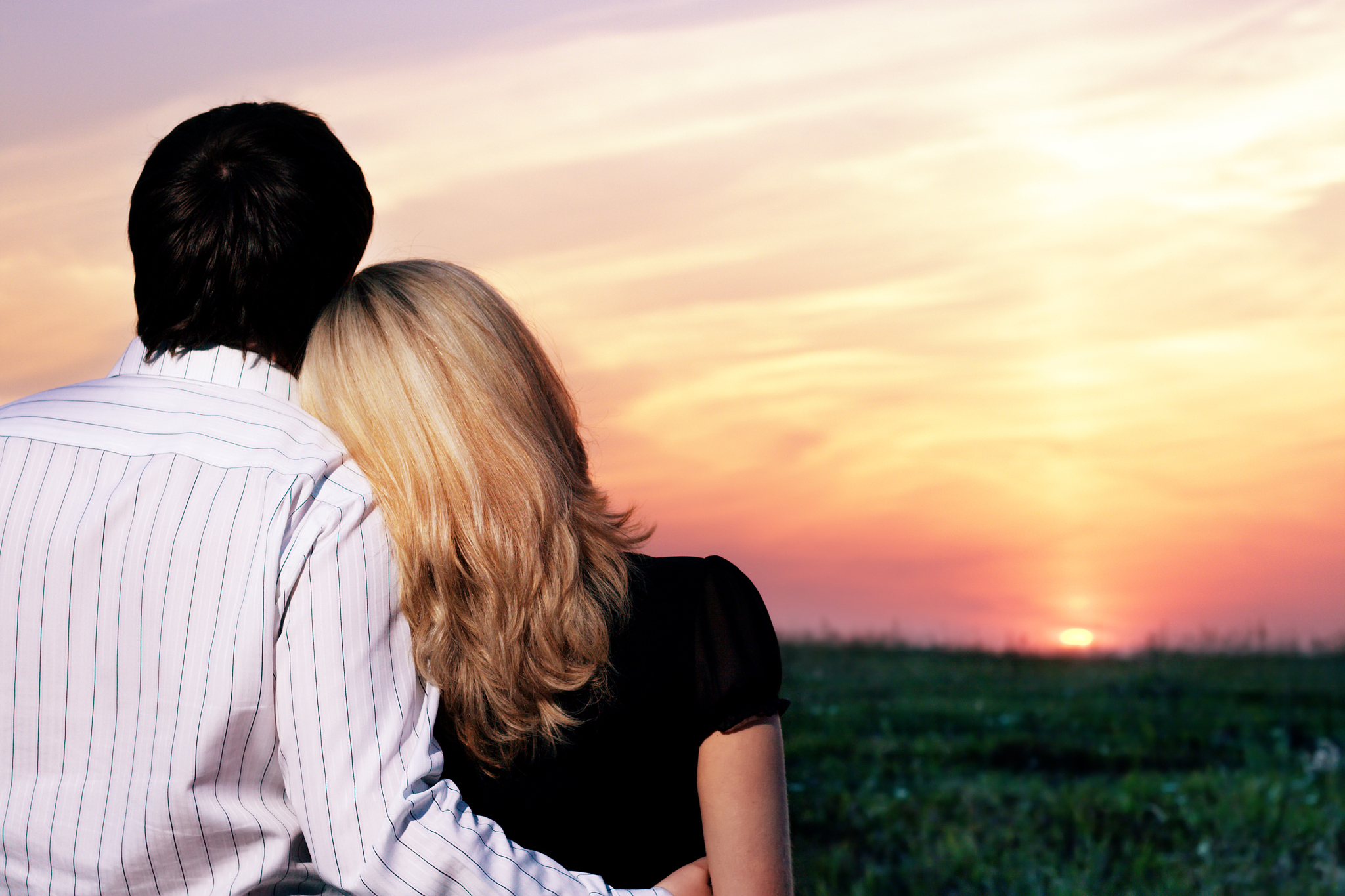 young couple at sunset
