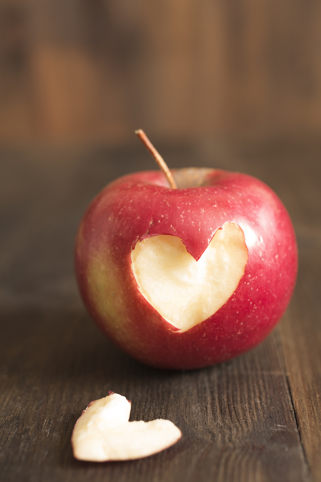 apple with a heart cut into it