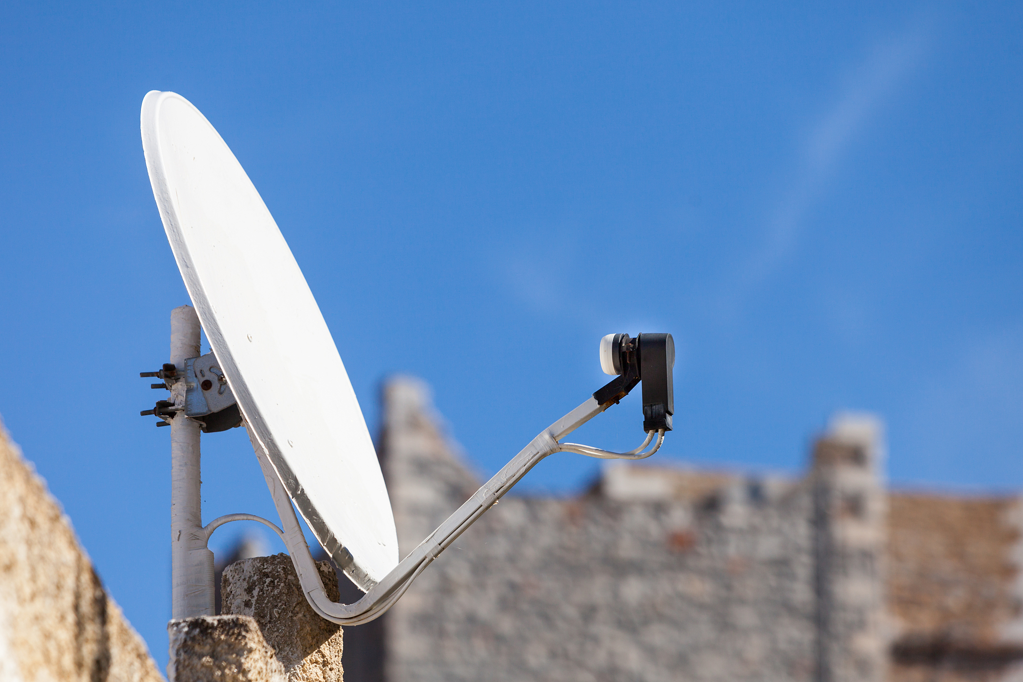satellite dish antenna on blue sky