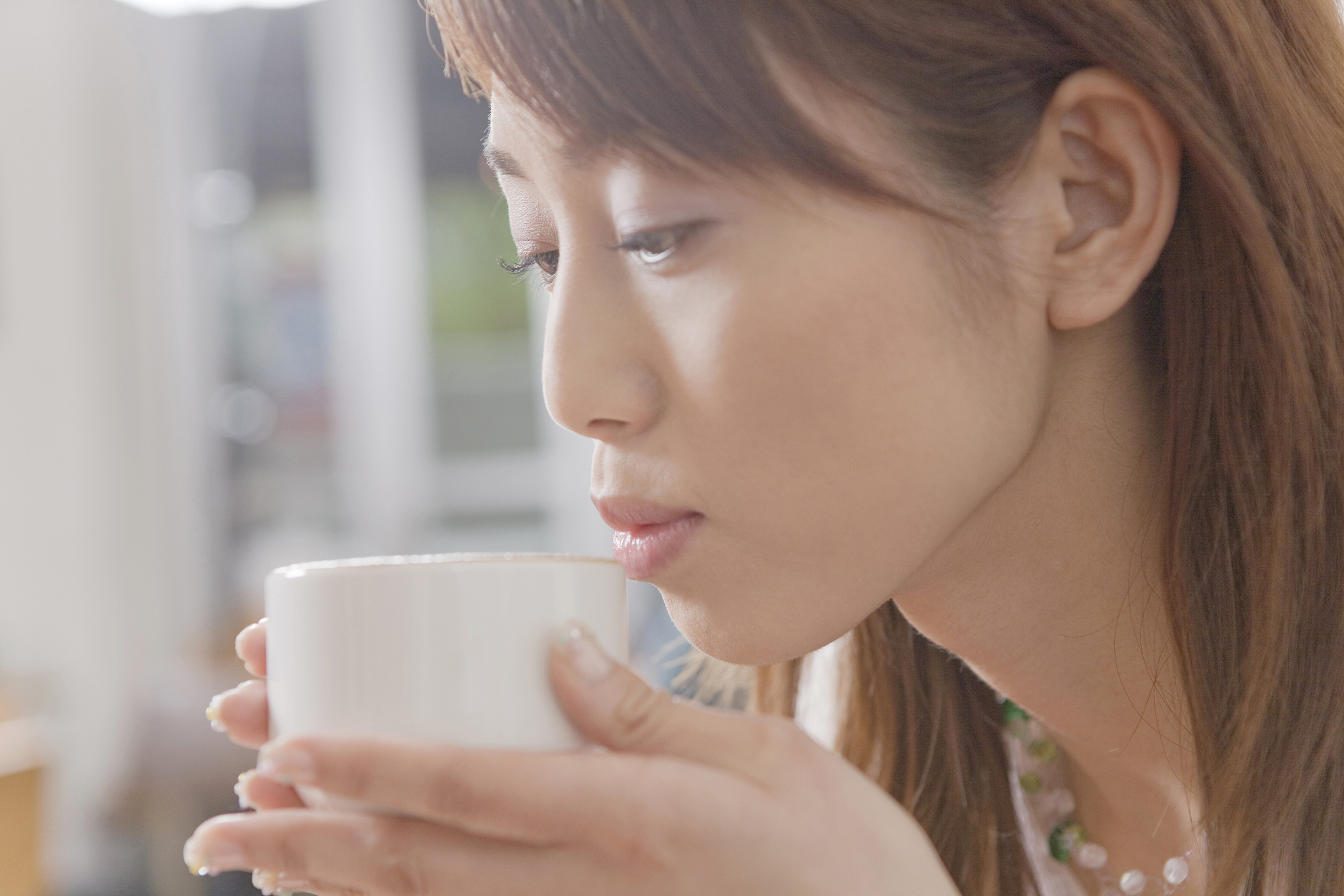 woman drinking coffee