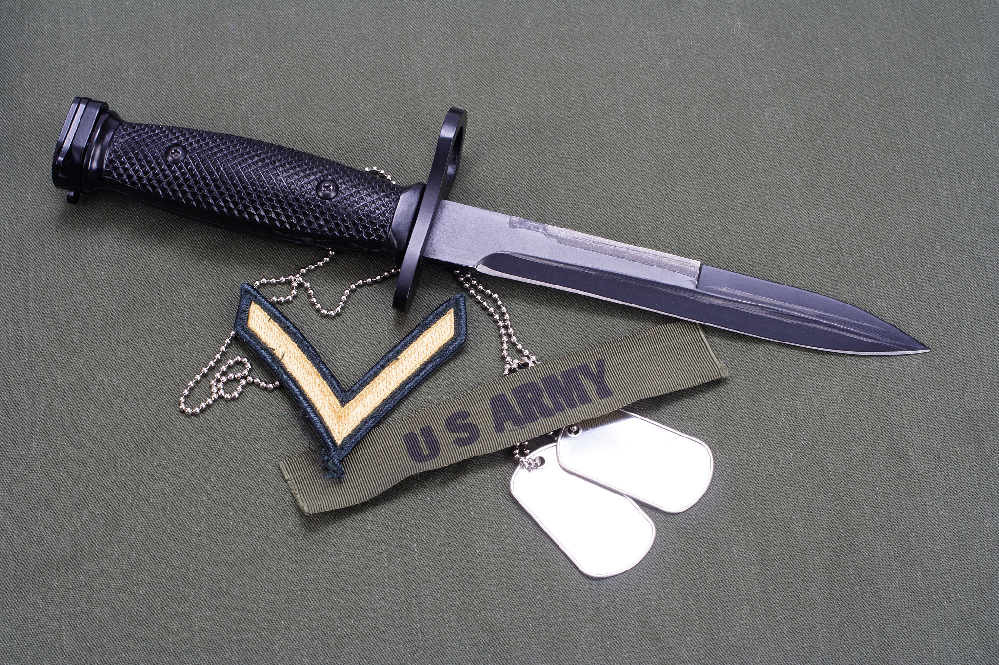 bayonet and dog tags on us army uniform