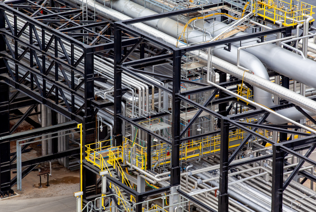 Briefly describe the industry background and necessity of intelligent construction development