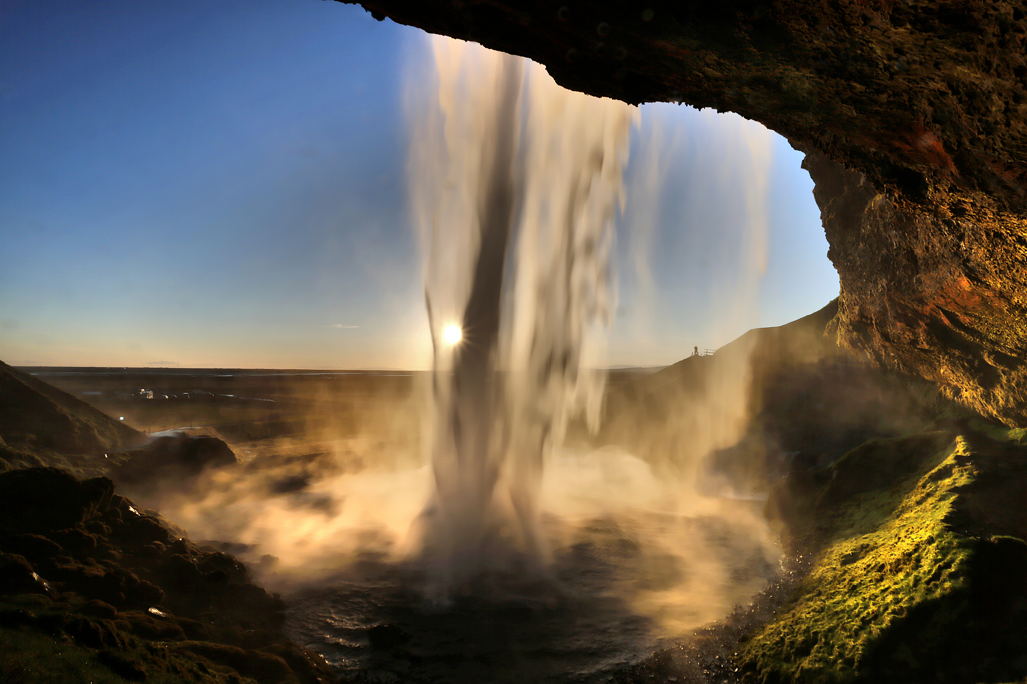 scenic view of waterfall against sky