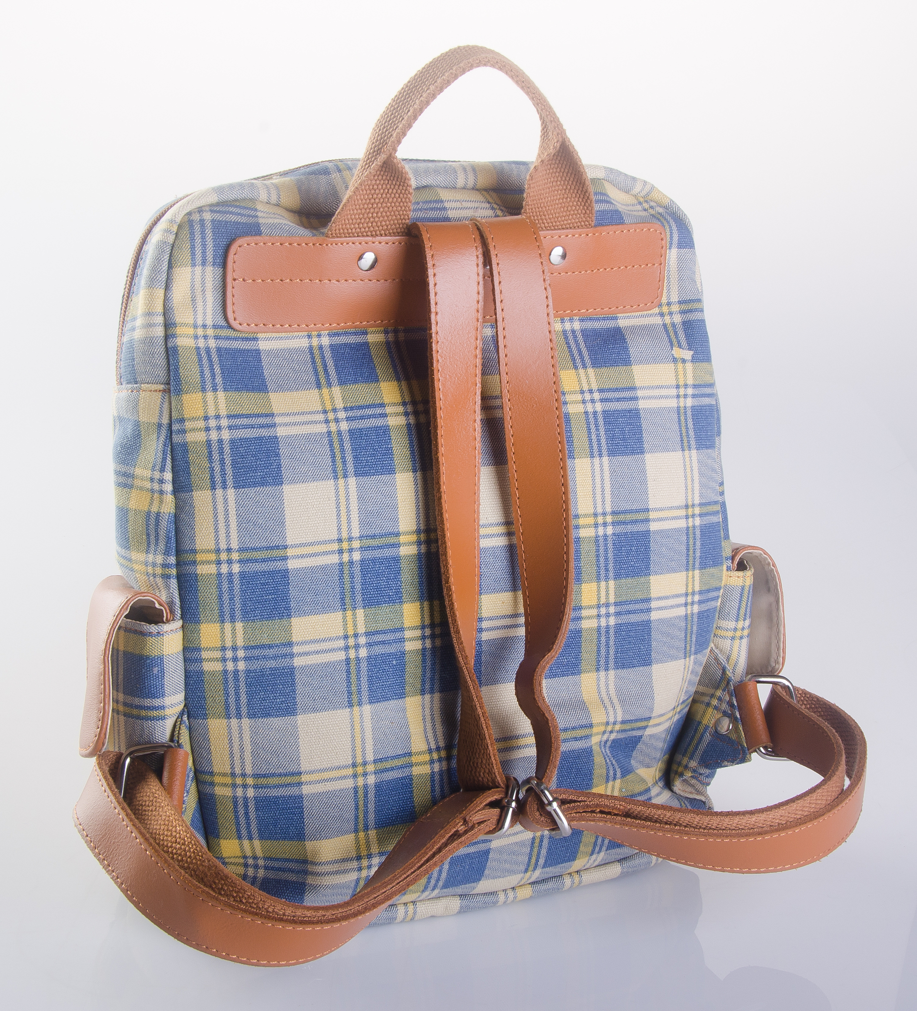 close-up of backpack against white background