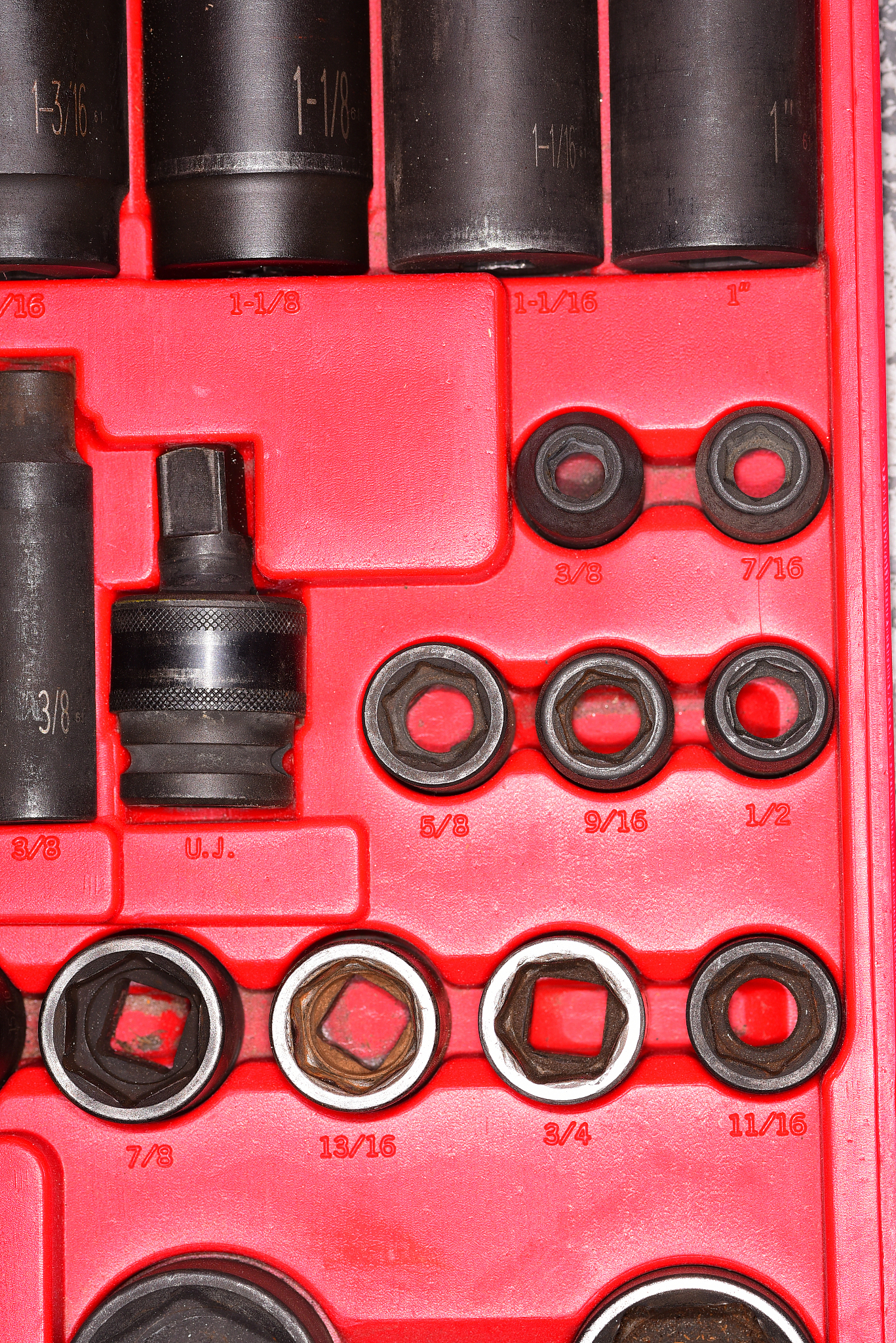 impact tool socket set with used and unused pieces