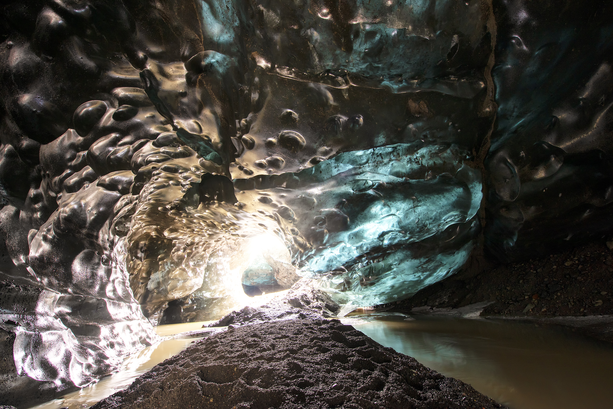 crystal ice caves iceland. it is popular with the island's touri