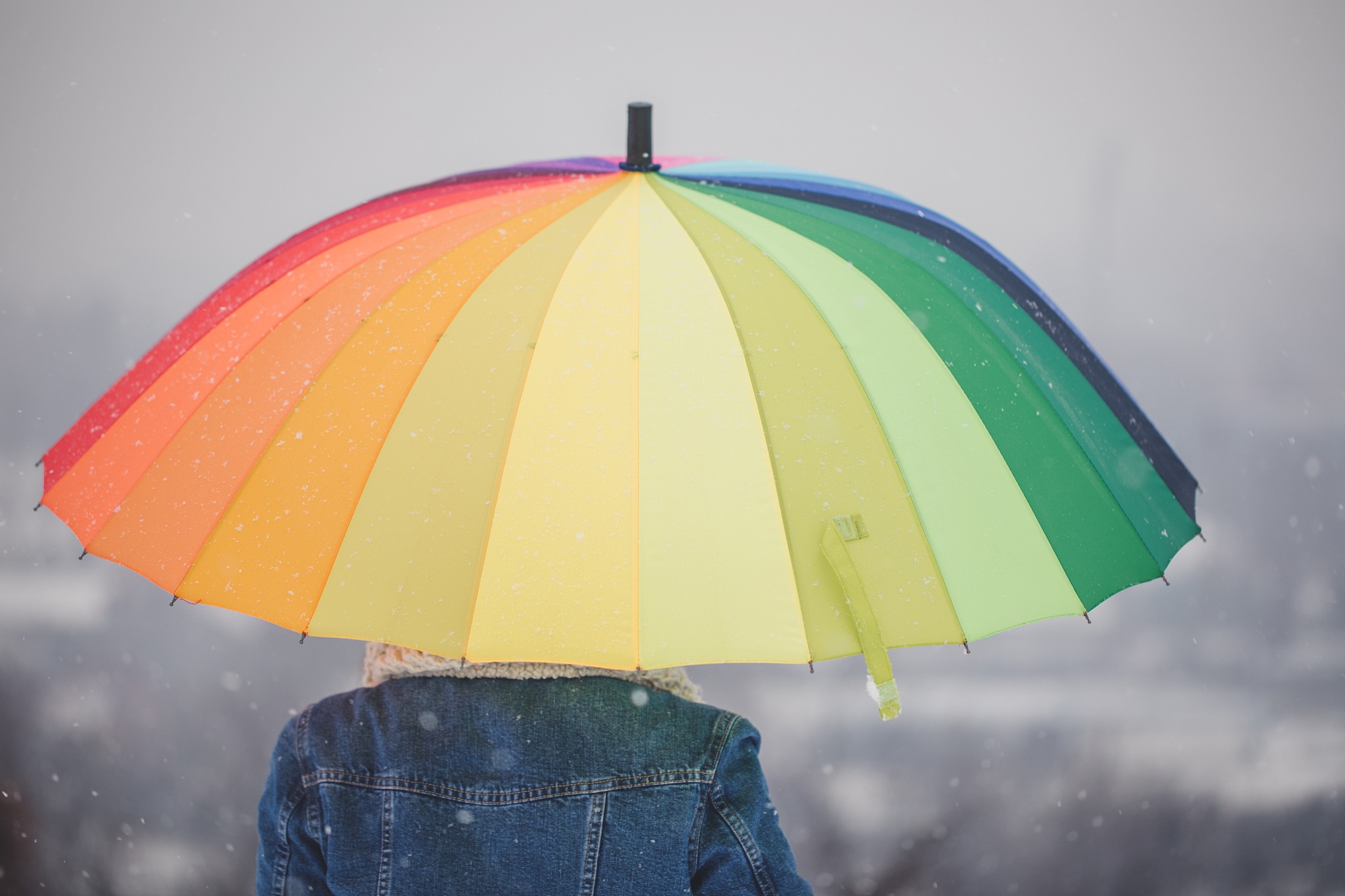 woman with rainbow umbrella