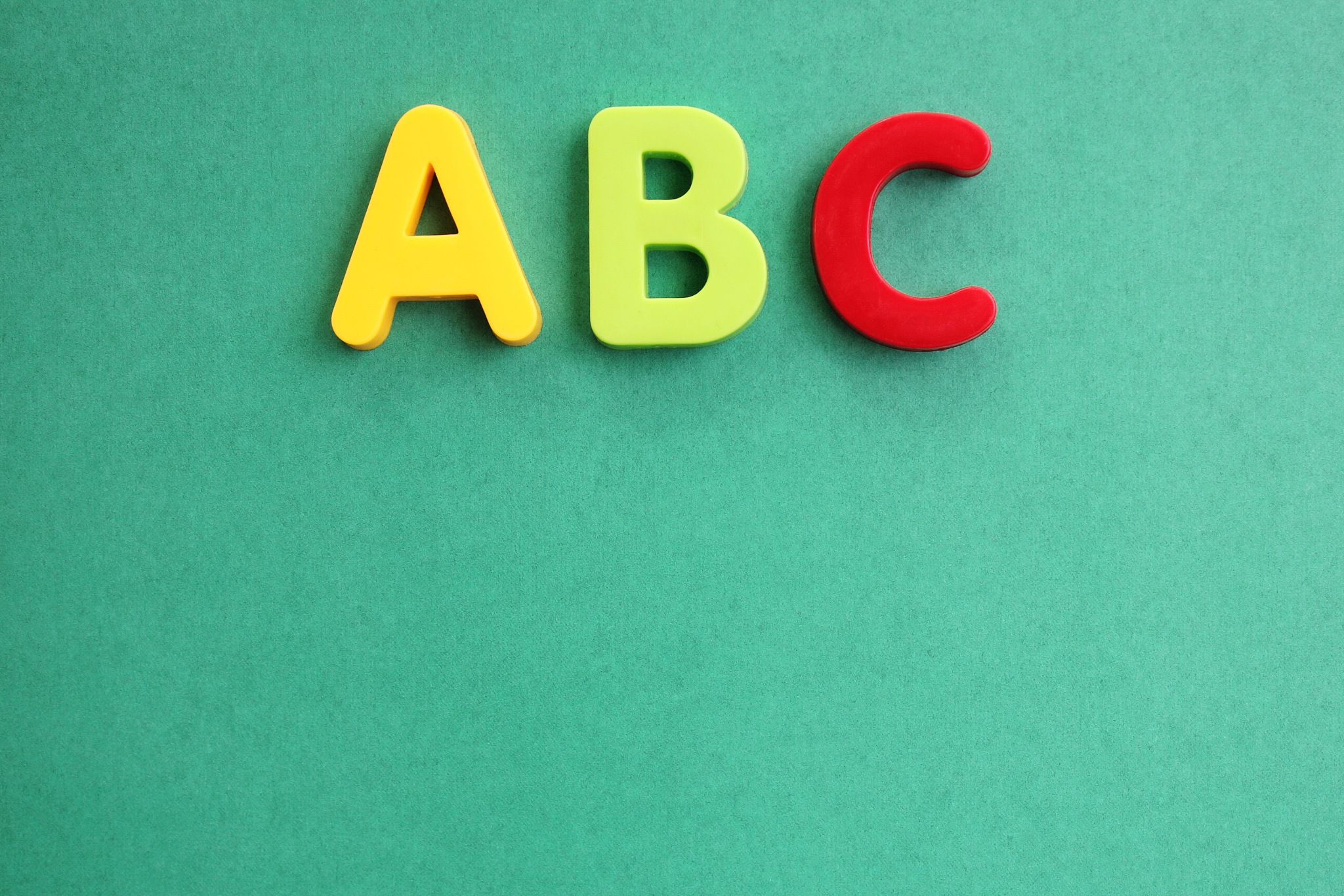 abc first letter of the english alphabet on a green background. 