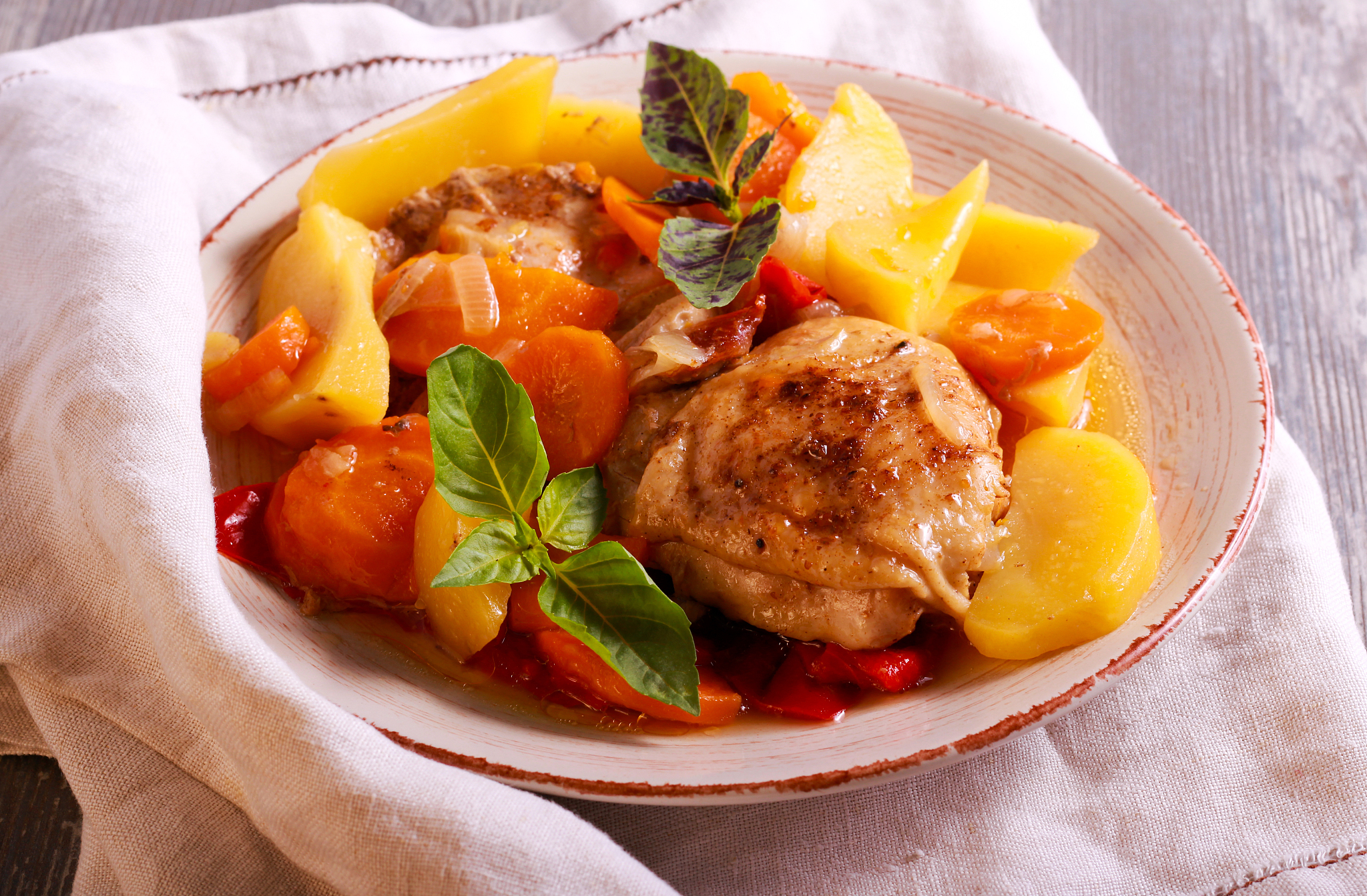 chicken and vegetable stew on plate