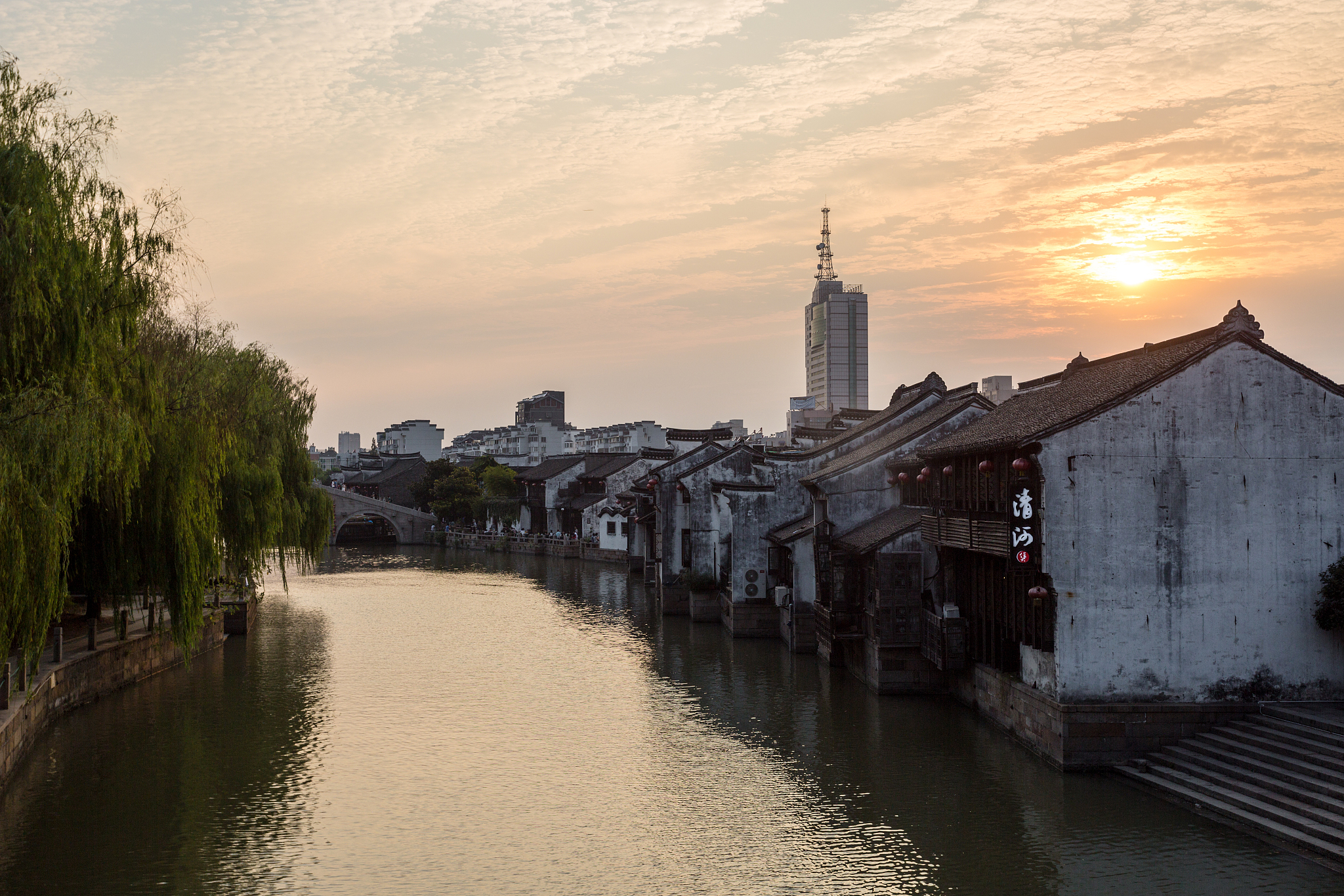 traditional houses along the grand canal against sunset,jiaxing,