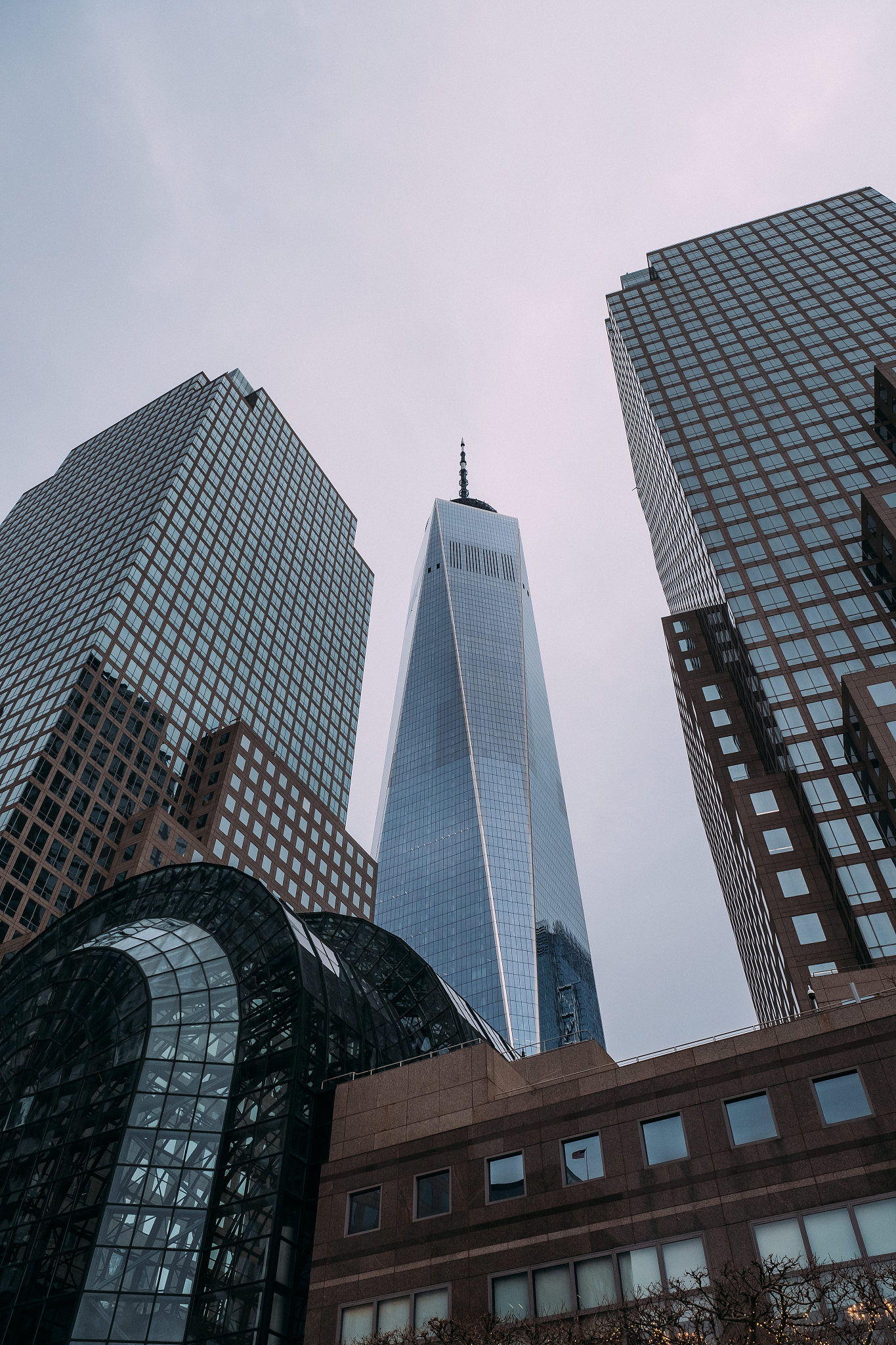 the facade of the modern glass buildings of the financial distri