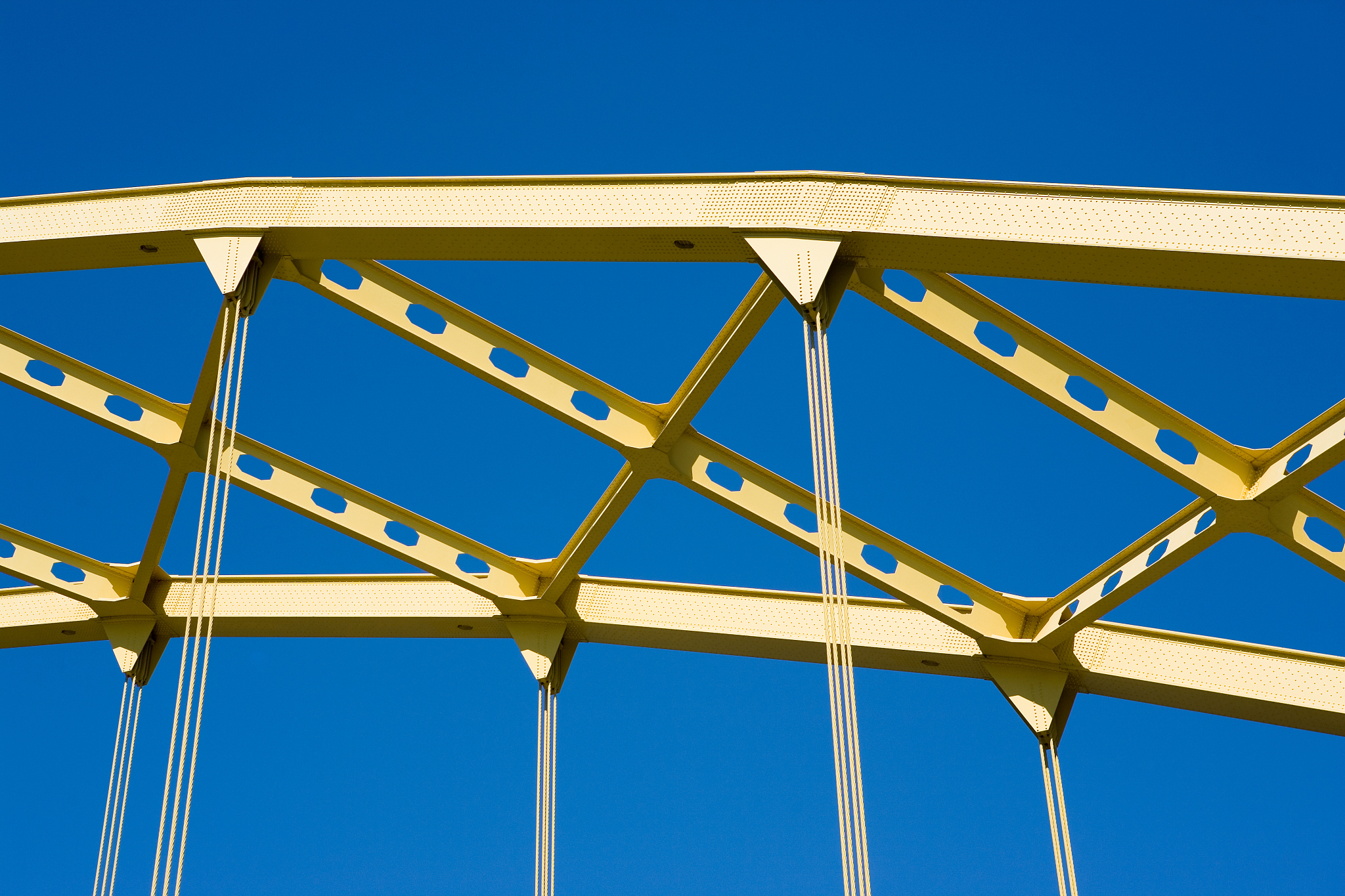 a man is 60 Kg a cow is 50kg and a bridge has a weight limit of 500 kg how is the man going to cross the bridge with the cow