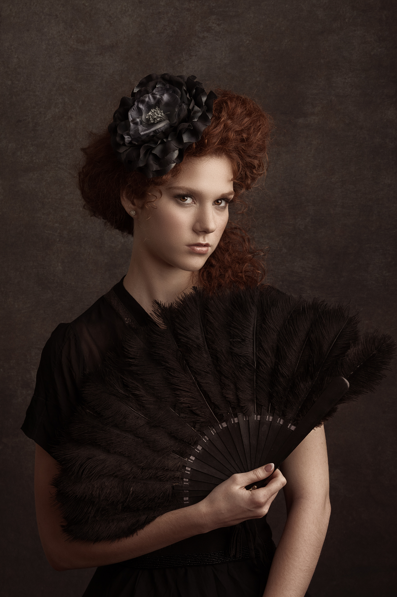 woman holding a fan - 1900s vintage style