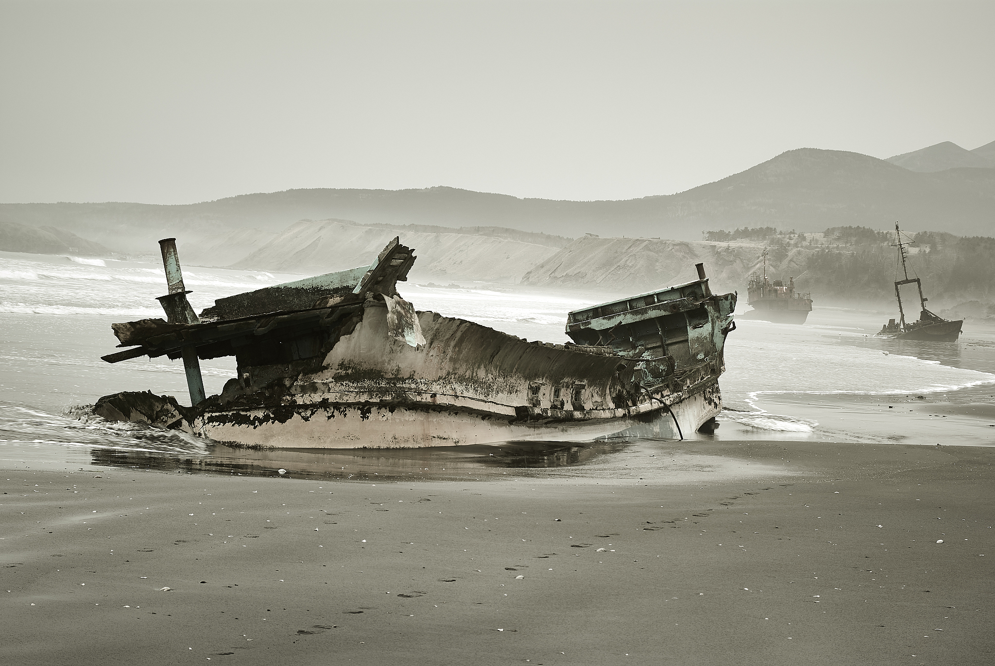 old shipwreck about coast of kunashir island, kurils islands, gl