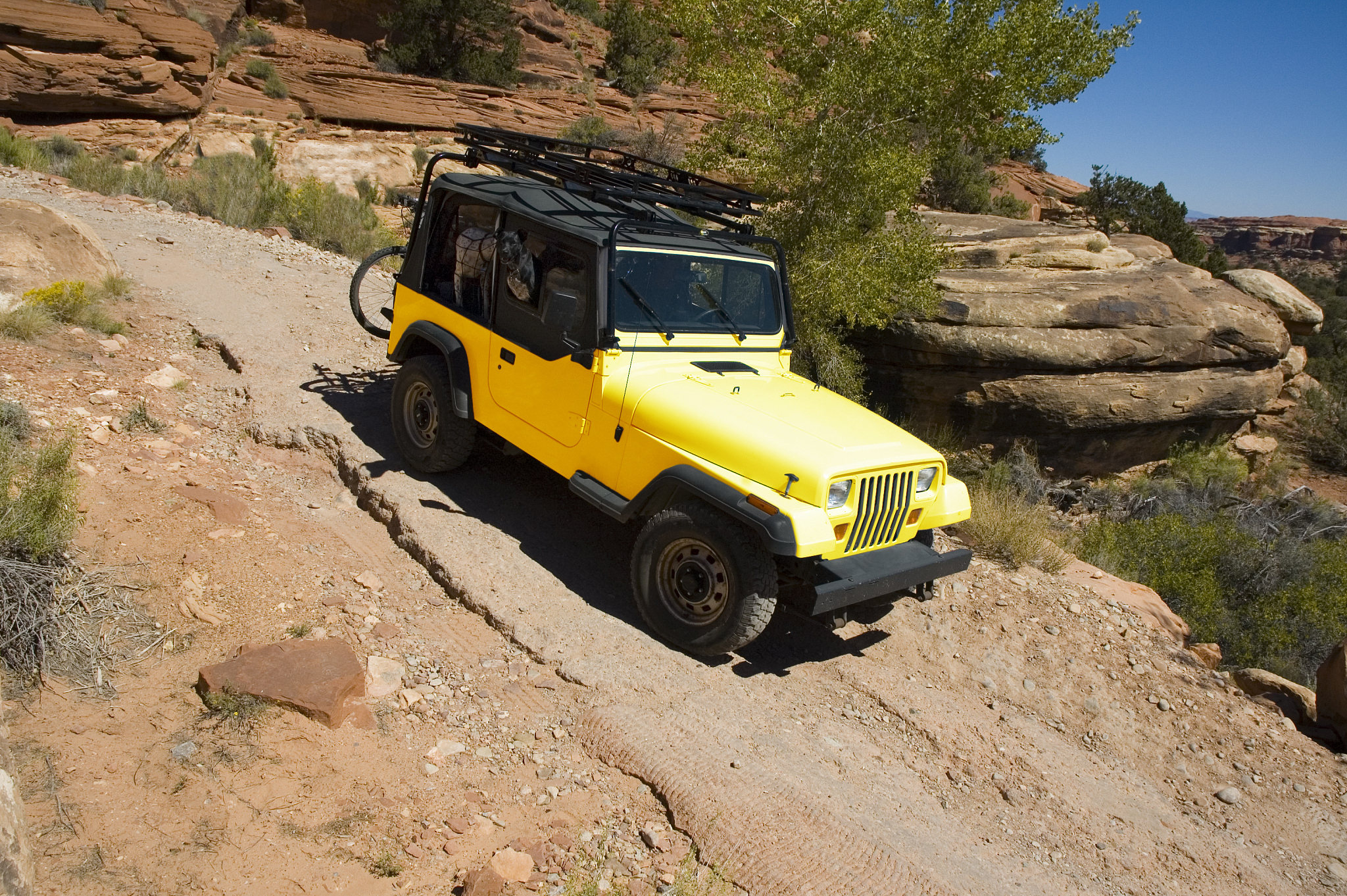 4 wheel drive jeep on rugged road