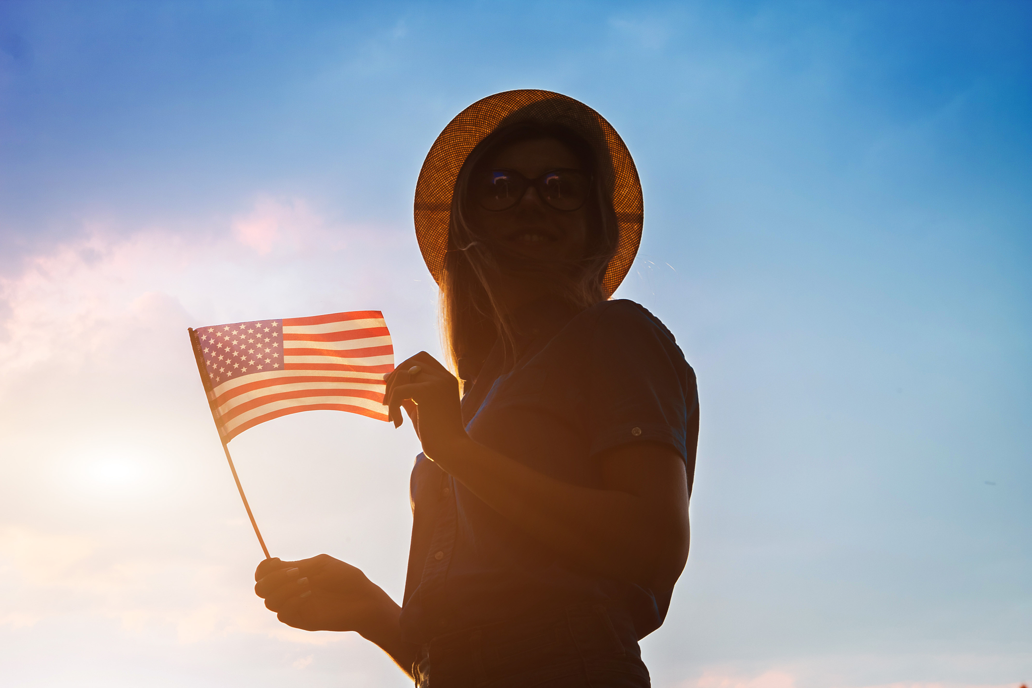 woman holding usa flag