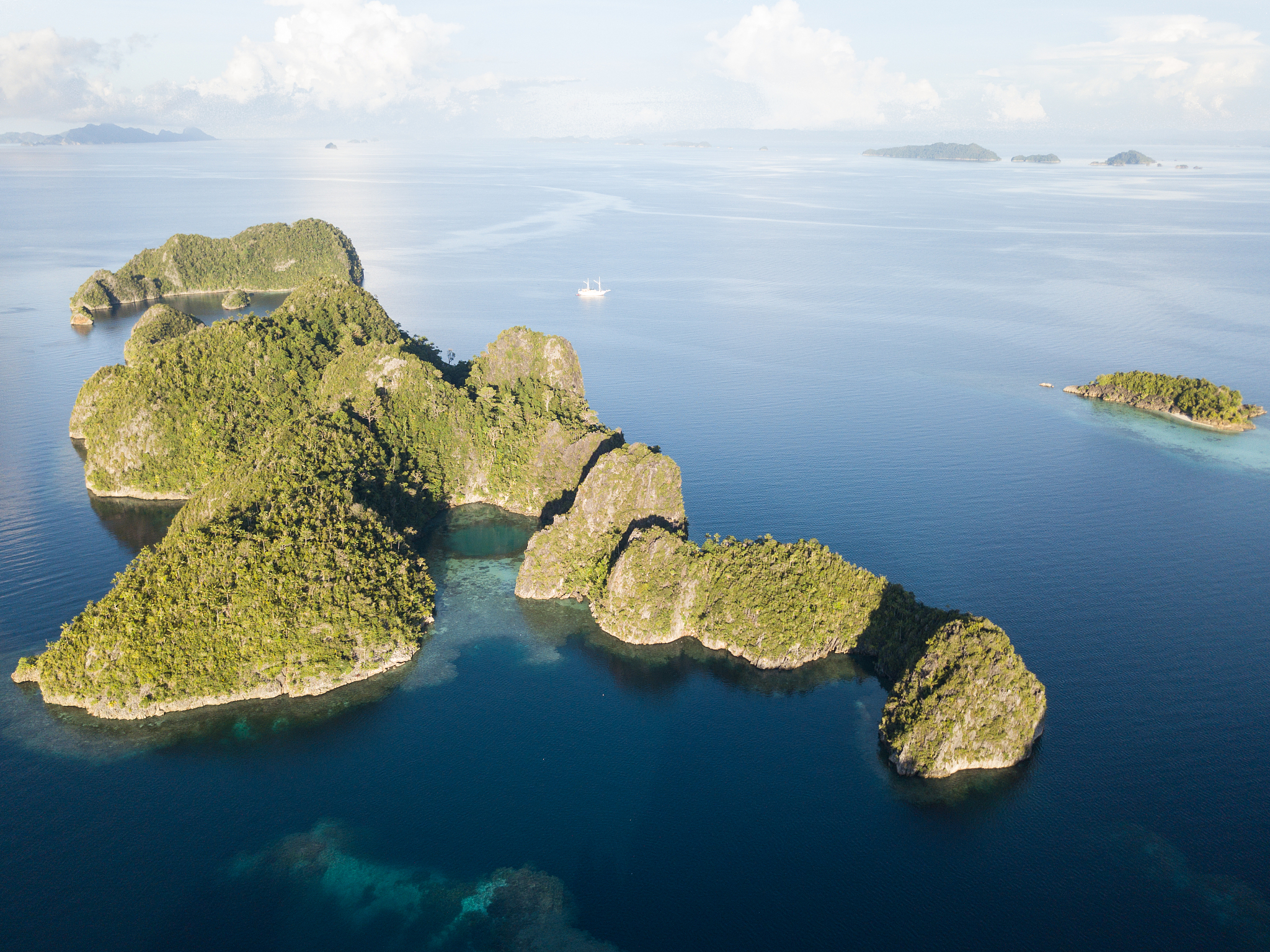 aerial of limestone islands in raja ampat