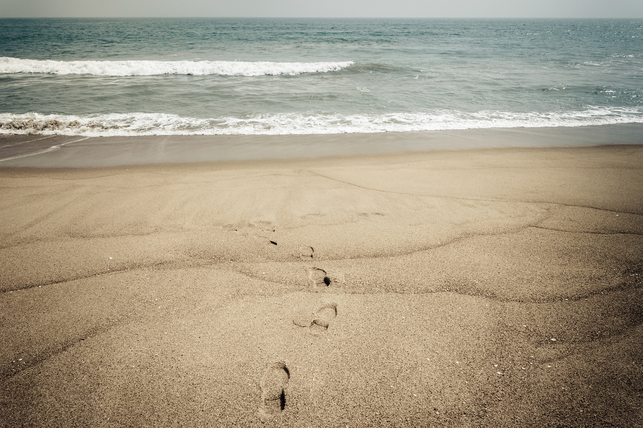 footprints on the sand, grand popo, benin