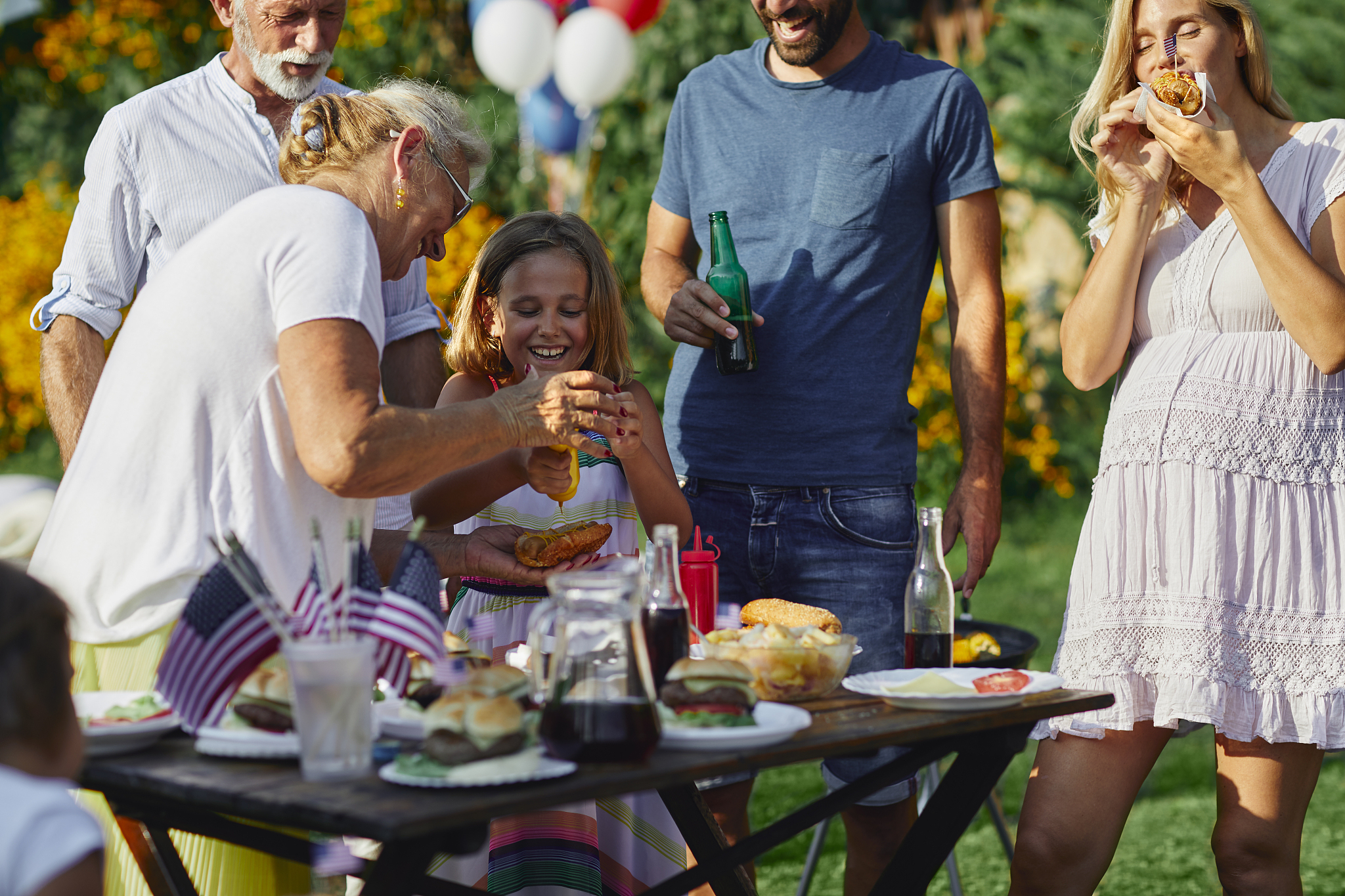 multi-generation family celebrating 4th of july