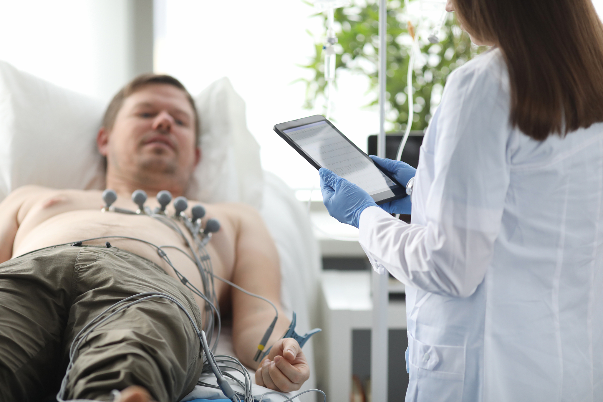 female doctor with tablet