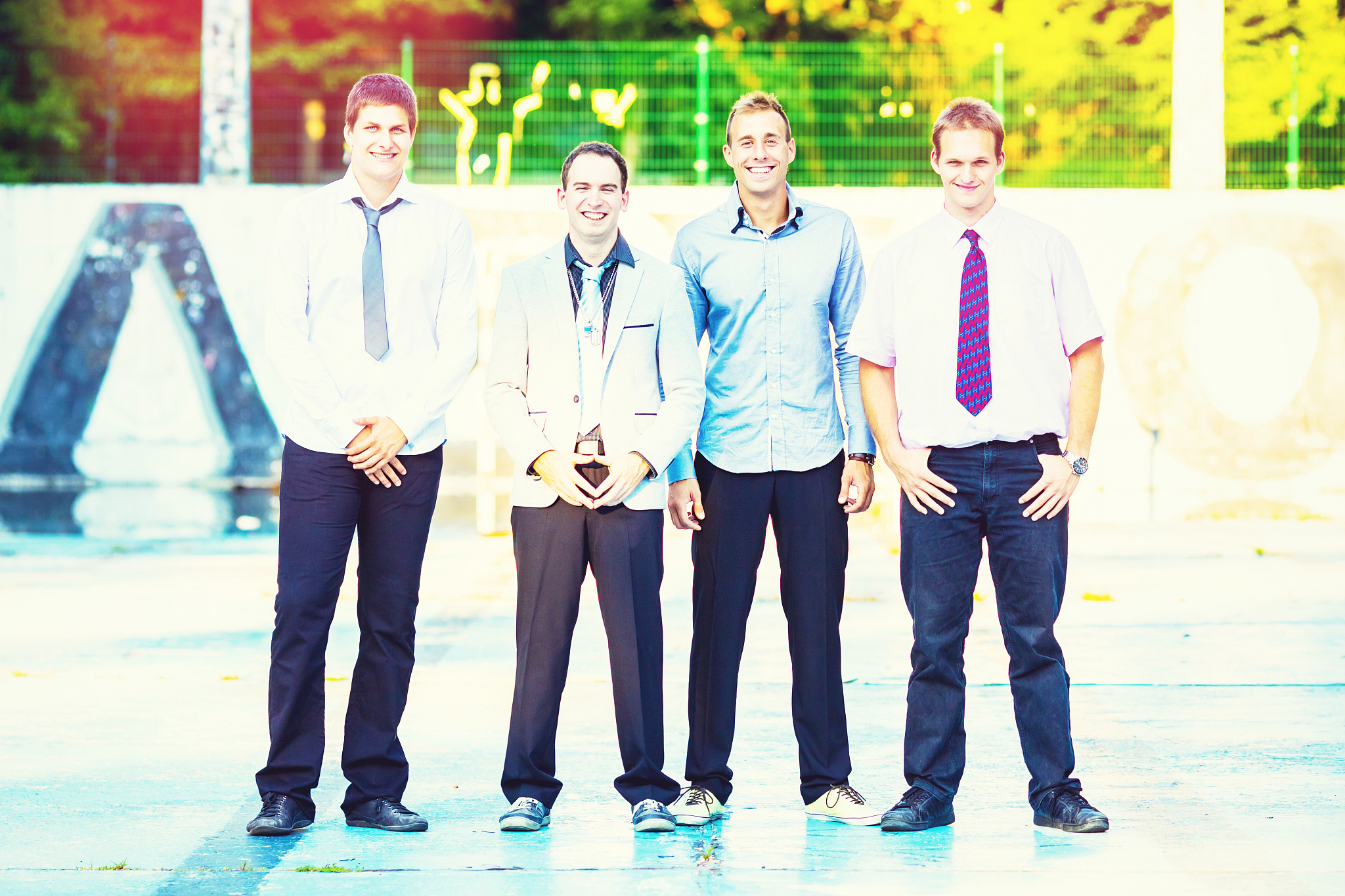 portrait of cheerful young adults outdoors