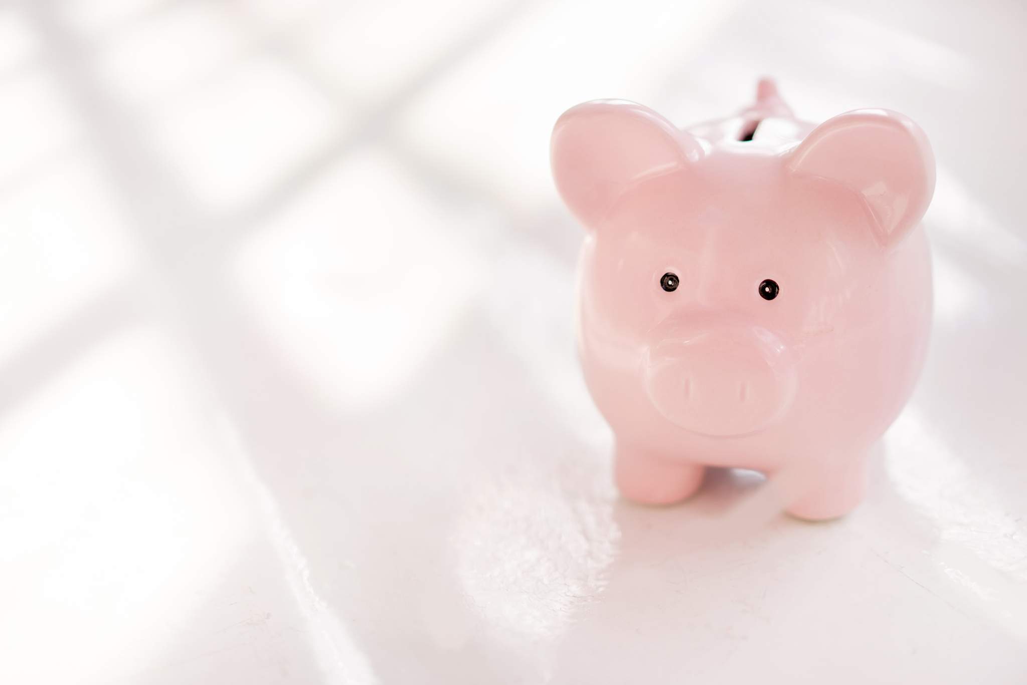 saving money in a piggybank