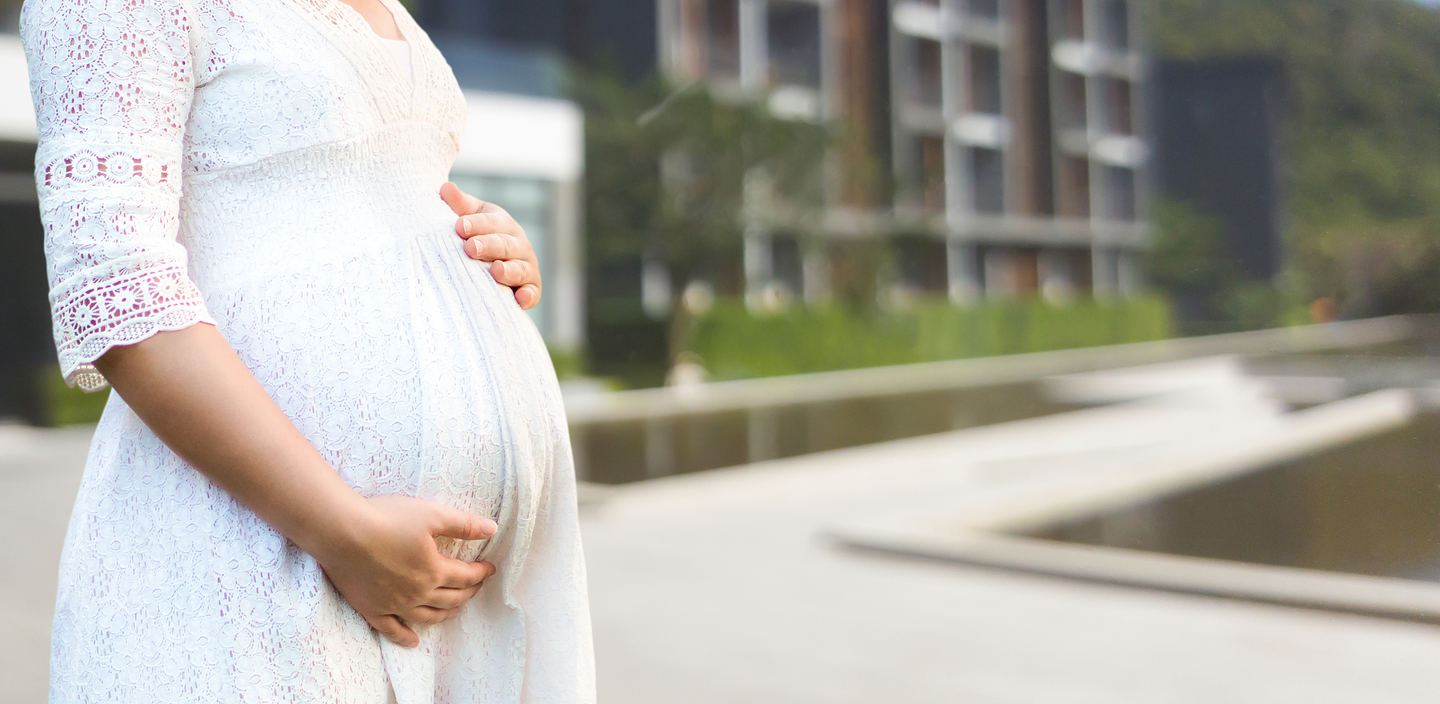 happy pregnant woman and expecting baby at home.