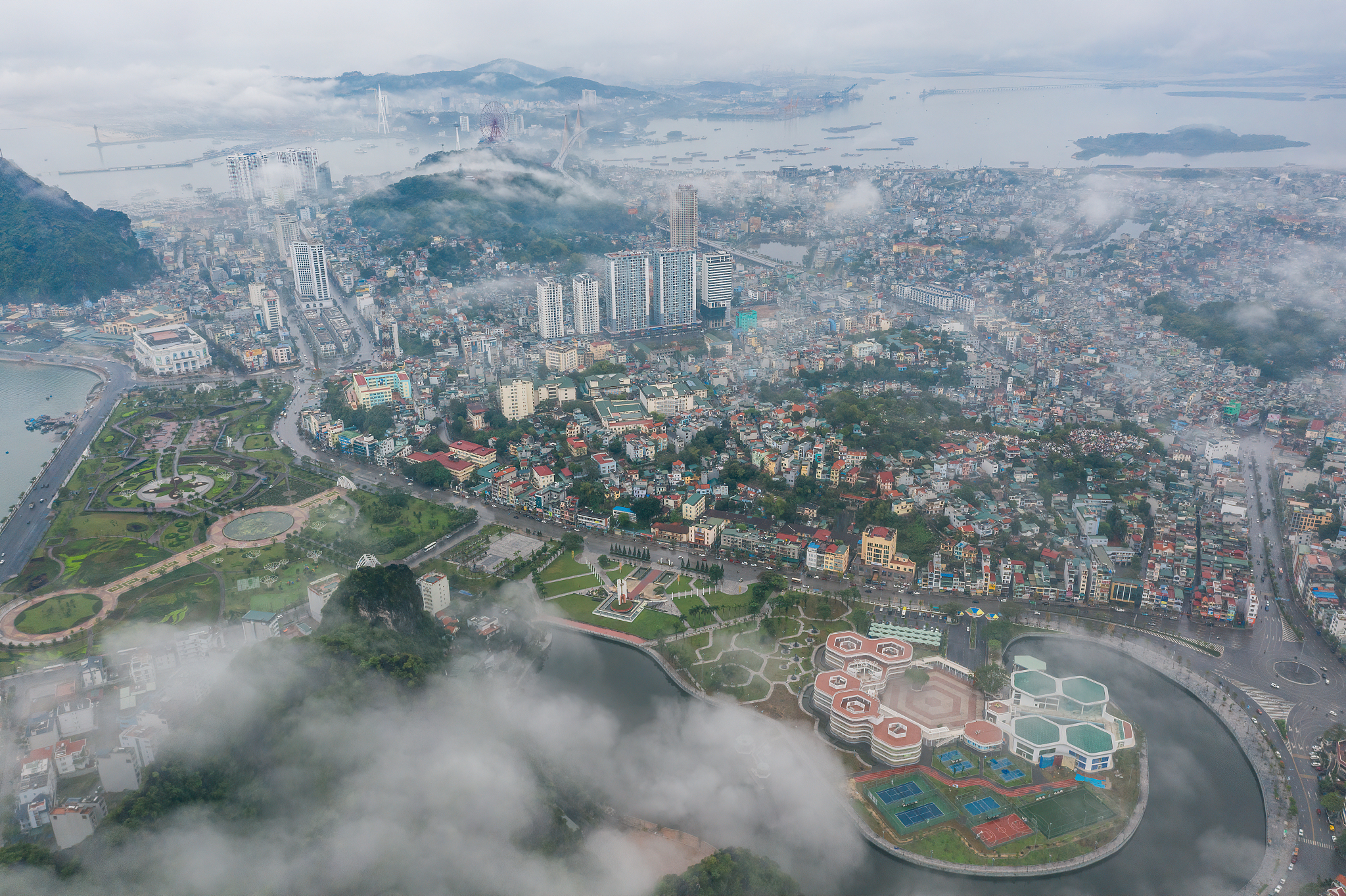 high angle view of river amidst buildings in city