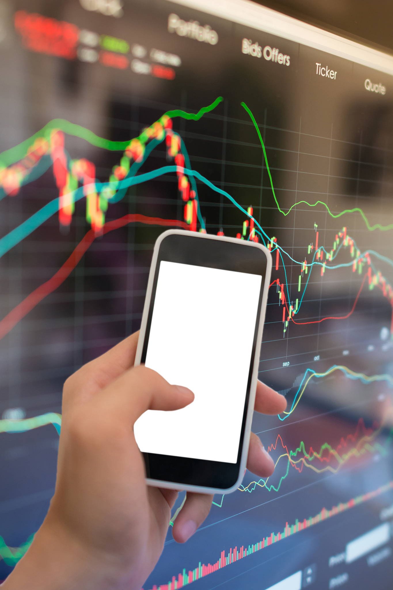 using smart phone in stock market graph and office work