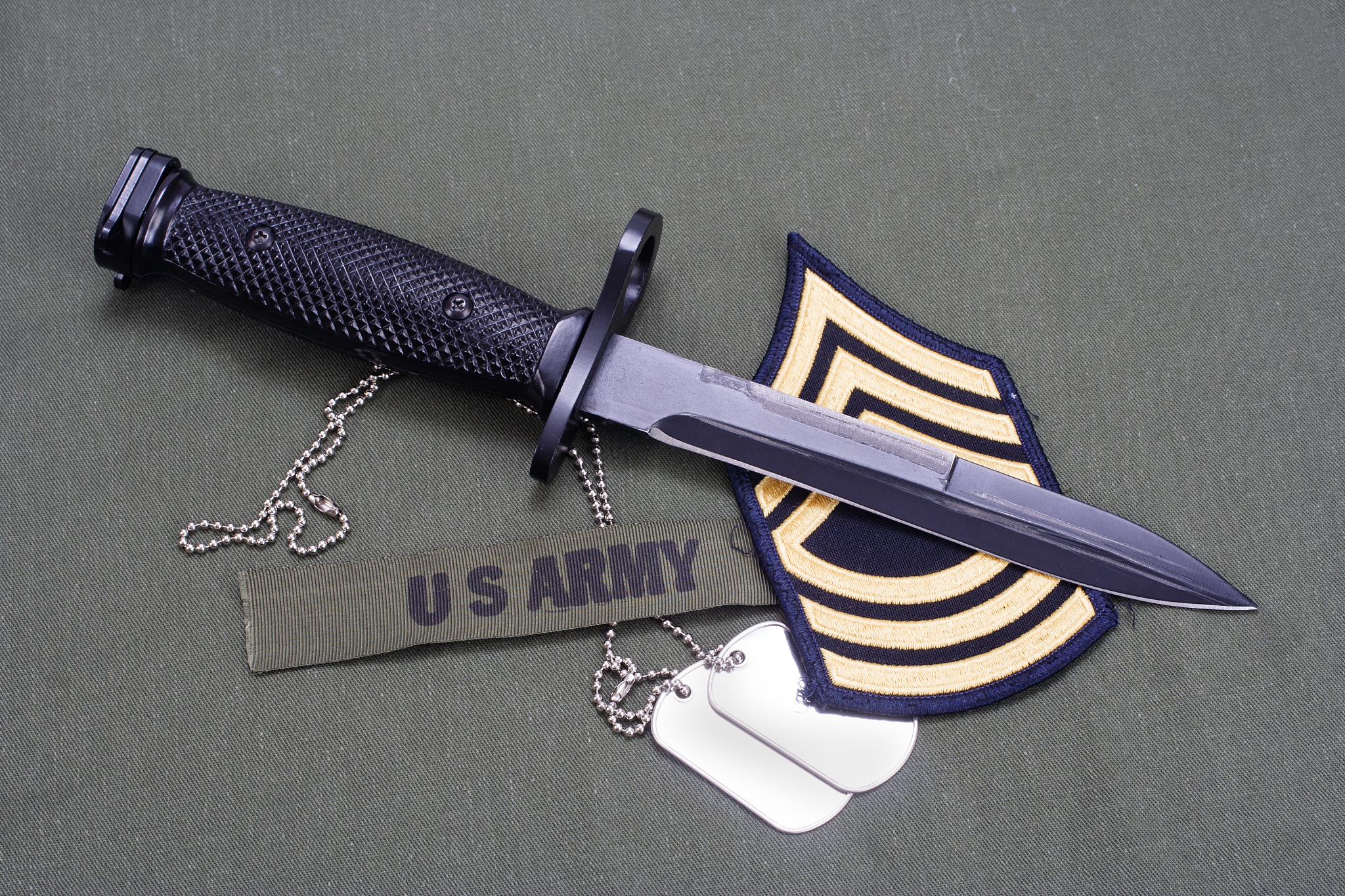 bayonet and dog tags on us army uniform