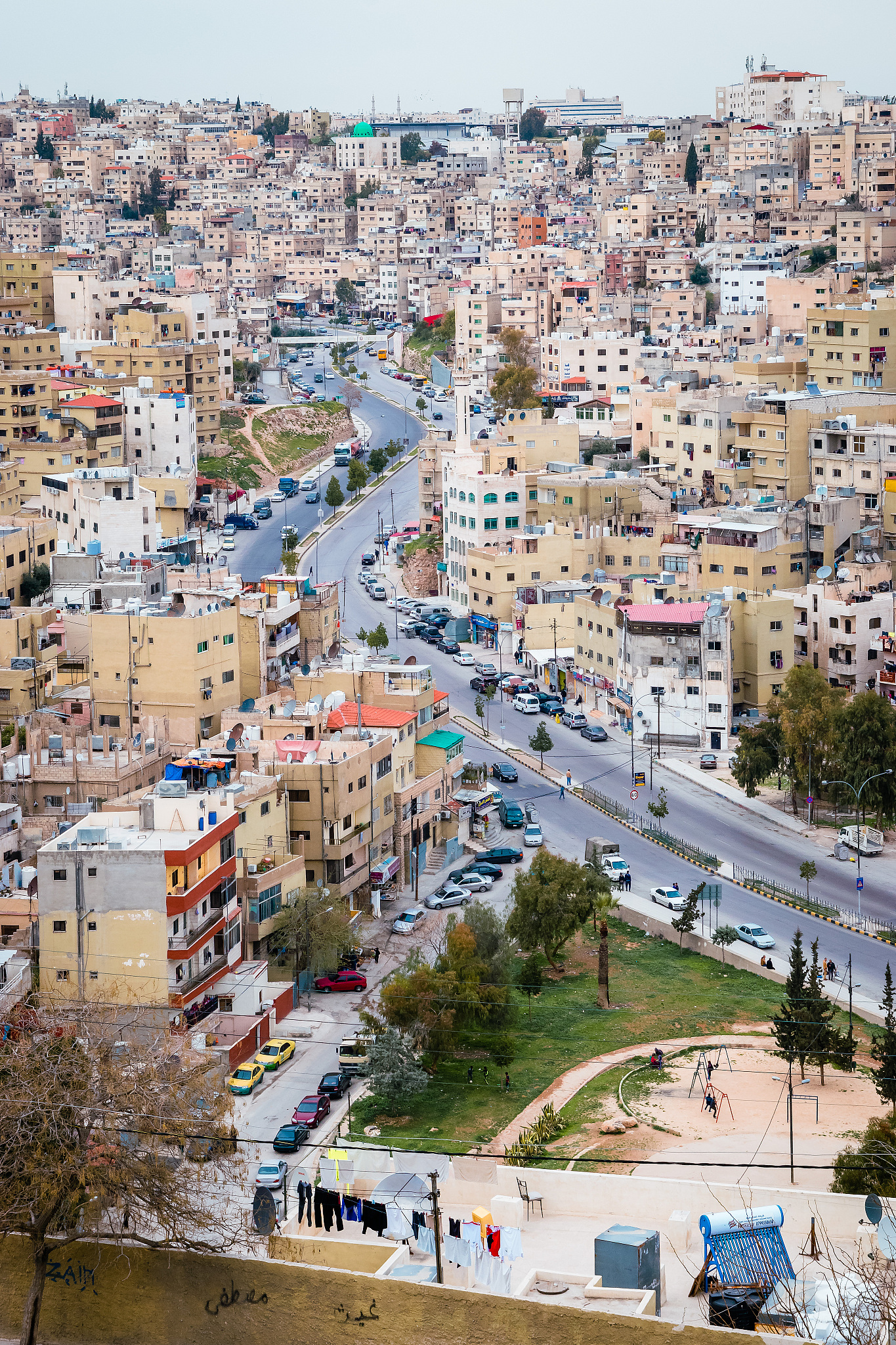 high angle view of street and buildings in city