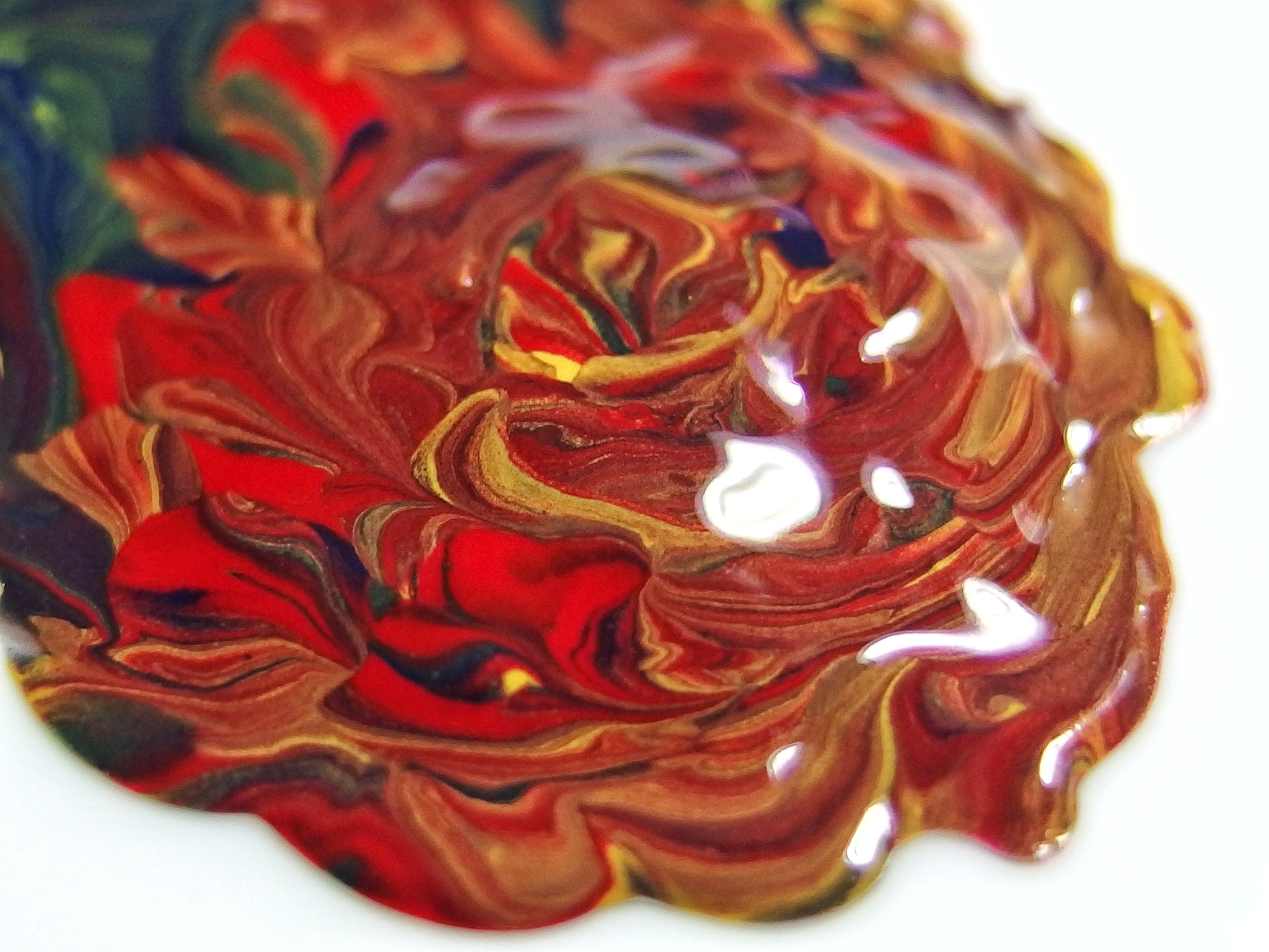 close-up of paint over white background