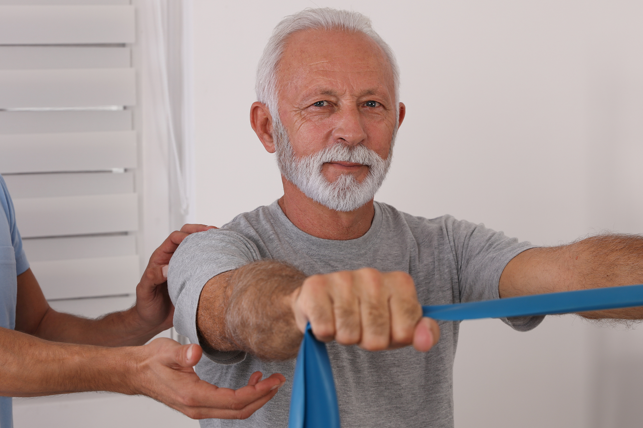 physiotherapy, sport injury rehabilitation of senior male patien