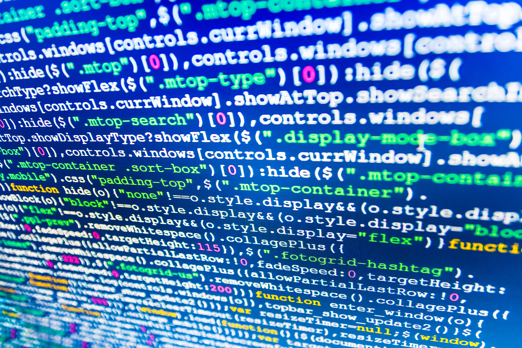 software developer programming code on computer