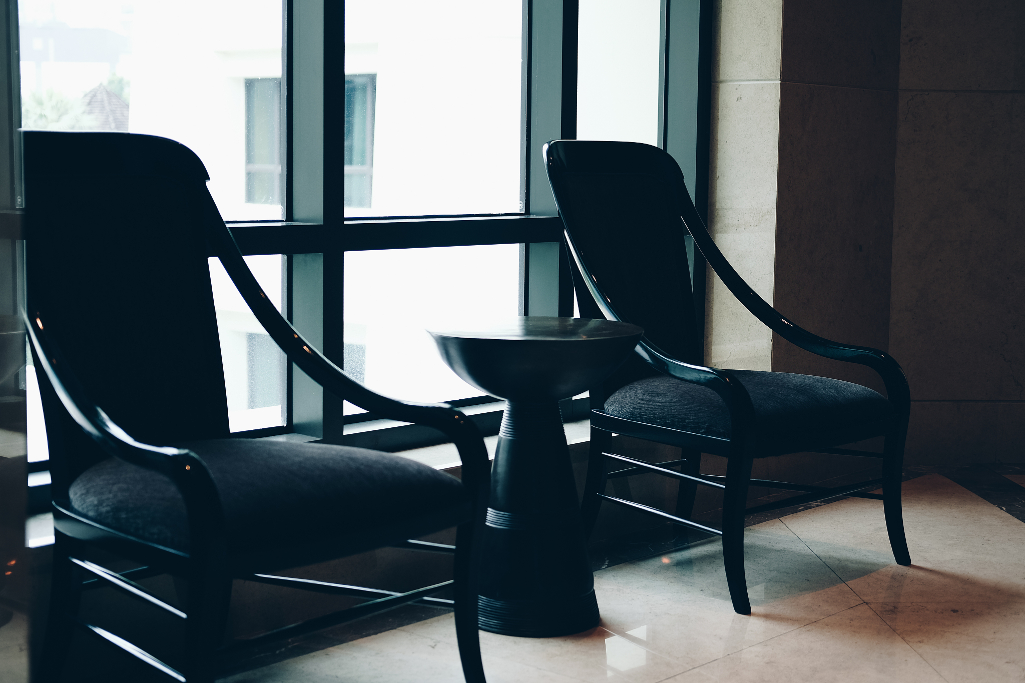 cushion wooden chair in living room.