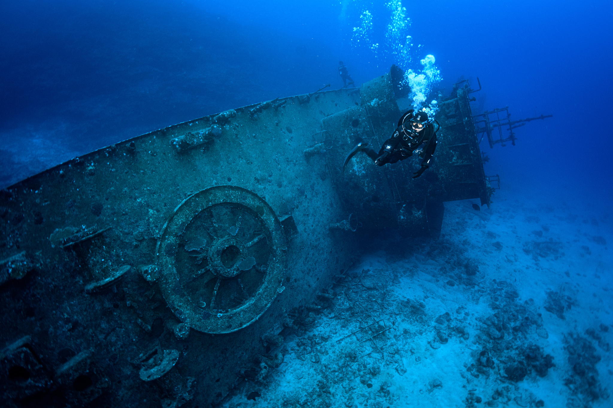 scuba diver swimming underwater